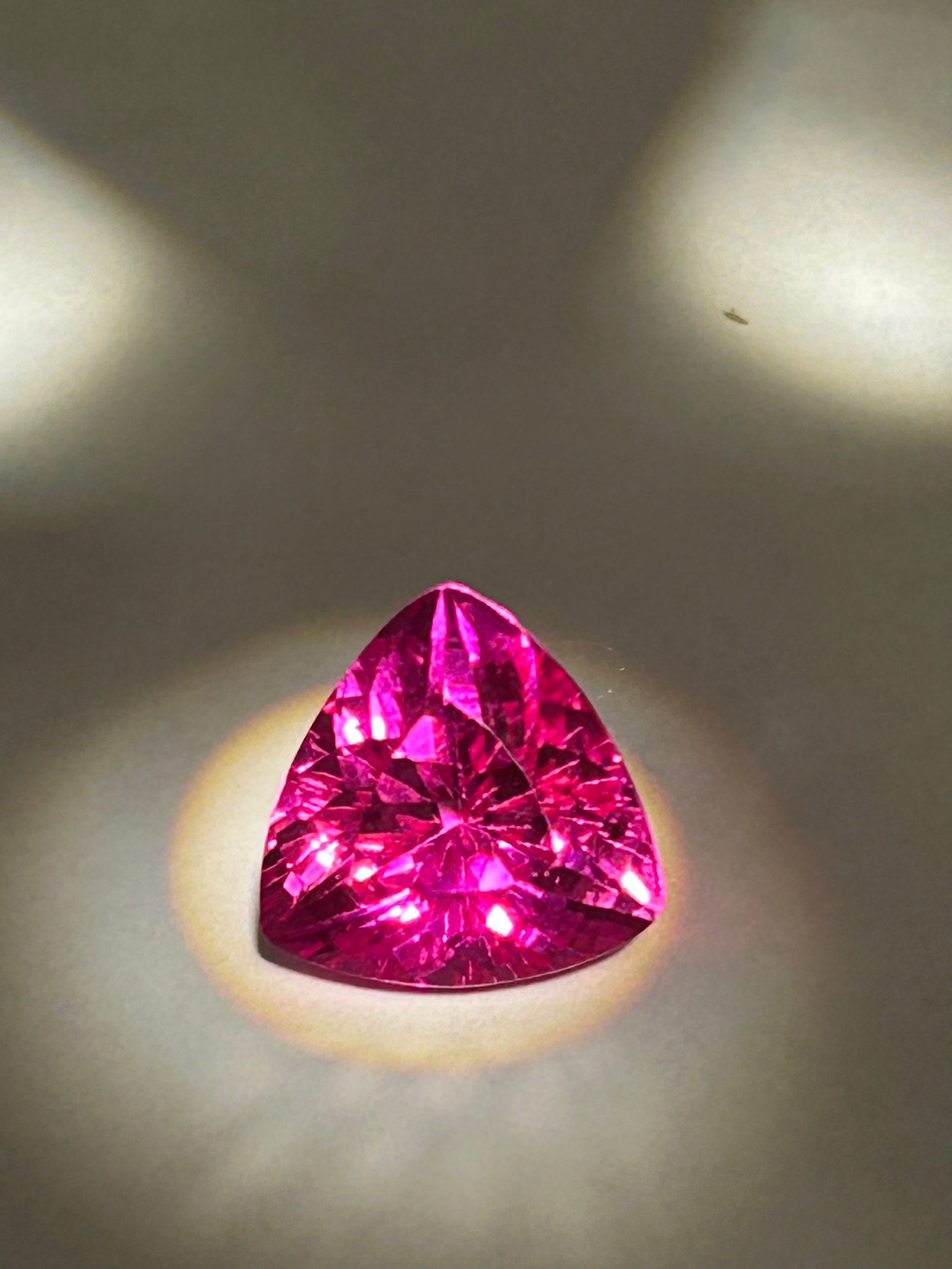 8.00 Carat --- Neon Pink Spinel --- Trillion Cut --- GGI Certified: A high-carat, natural gemstone, sourced from Burma. It is characterized by its intense, vibrant "neon" pink hue, exceptional brilliance, and durable nature, making it an excellent choice for luxury st