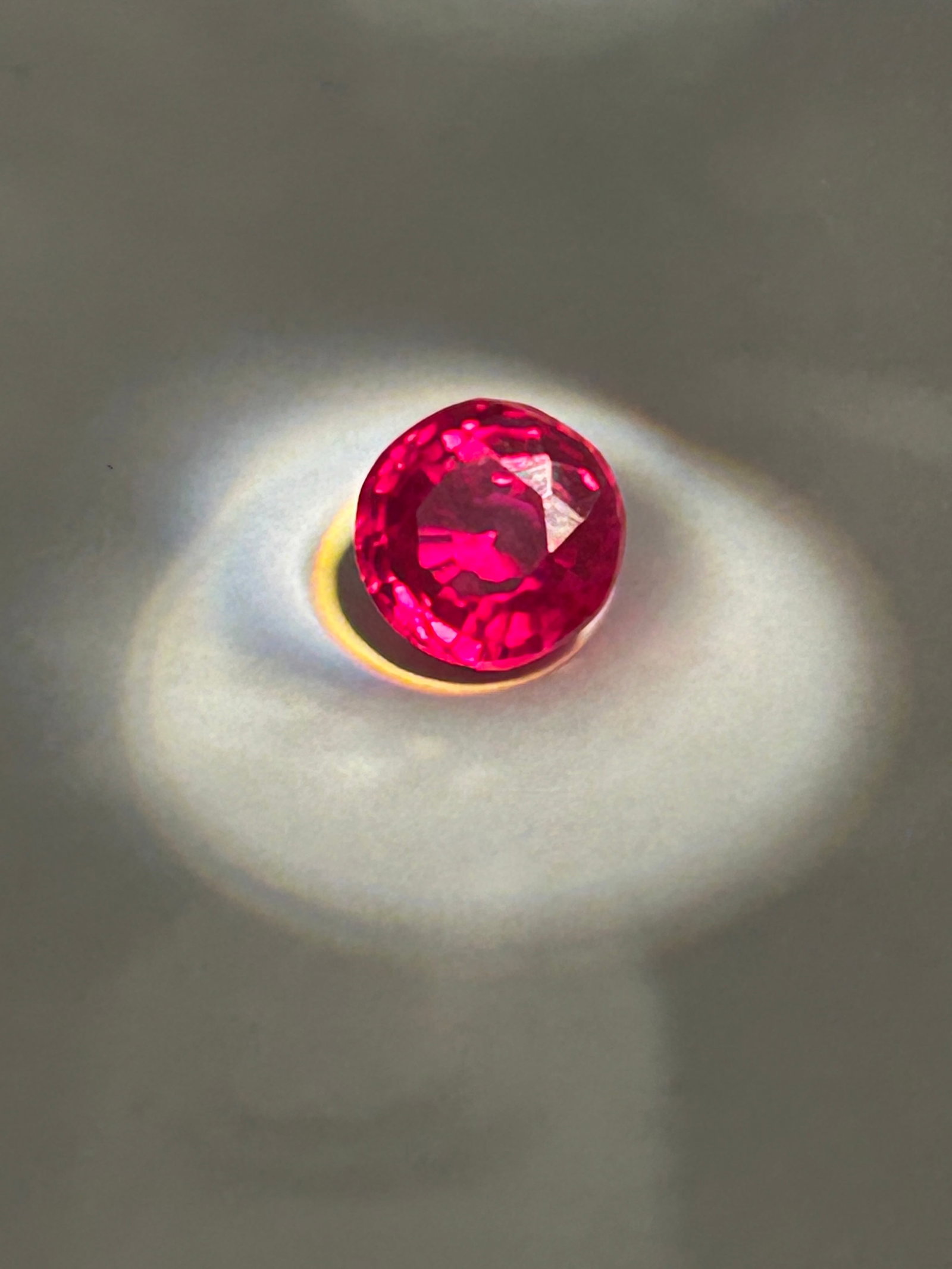 6.25 Carat ---- Mozambique Red Ruby ---- Round Cut ---- GGI Certified: These rubies display intense red to deep red hues. A high-quality ruby of this size, particularly one that is natural, "eye-clean" (without inclusions), and unheated, represents a significant investme