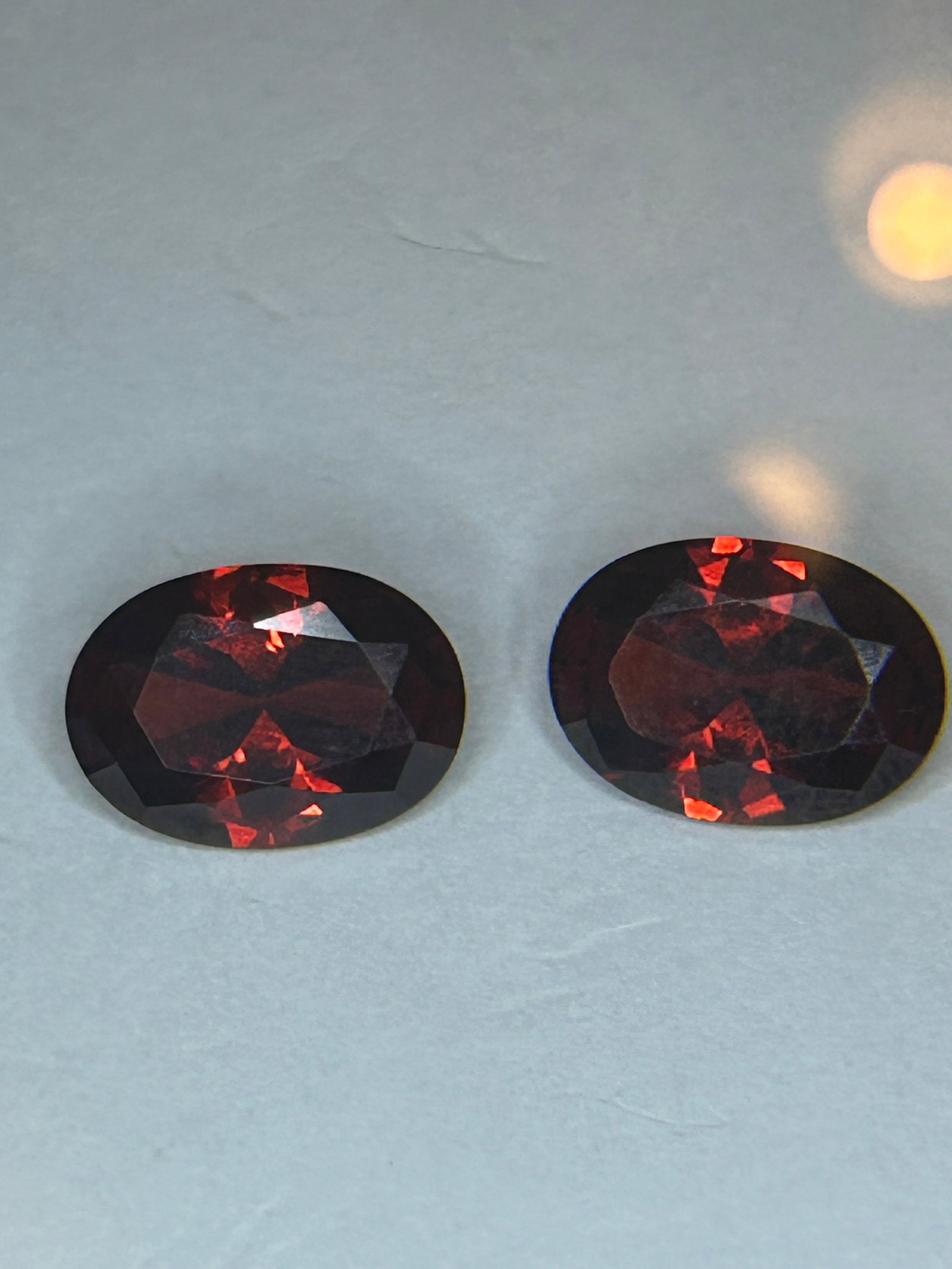 12.45 Carat --- Cambodian Cinnamon Zircon PAIR --- Oval Cut: a natural, high-brilliance gemstone. Mined primarily in the Ratanakiri province. Cinnamon is their natural color, Brown varieties are popular for their earthy, warm tones, high luster, and relative af