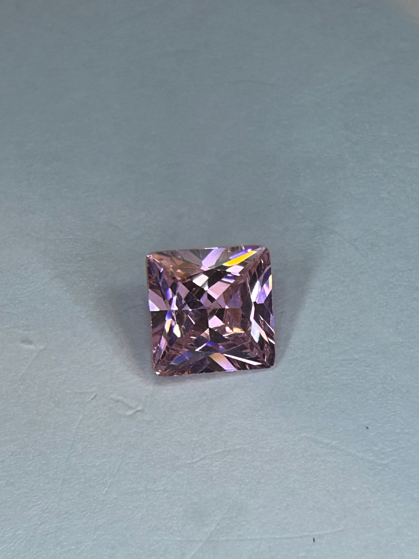 4.3 Carat --- Vietnamese Champagne Pink Zircon --- Princess Cut: A gemstone with a high refractive index, offering intense brilliance and "fire" (dispersion). Vietnamese zircon is renowned for vivid colors, often presenting a delicate to intense pink, and a