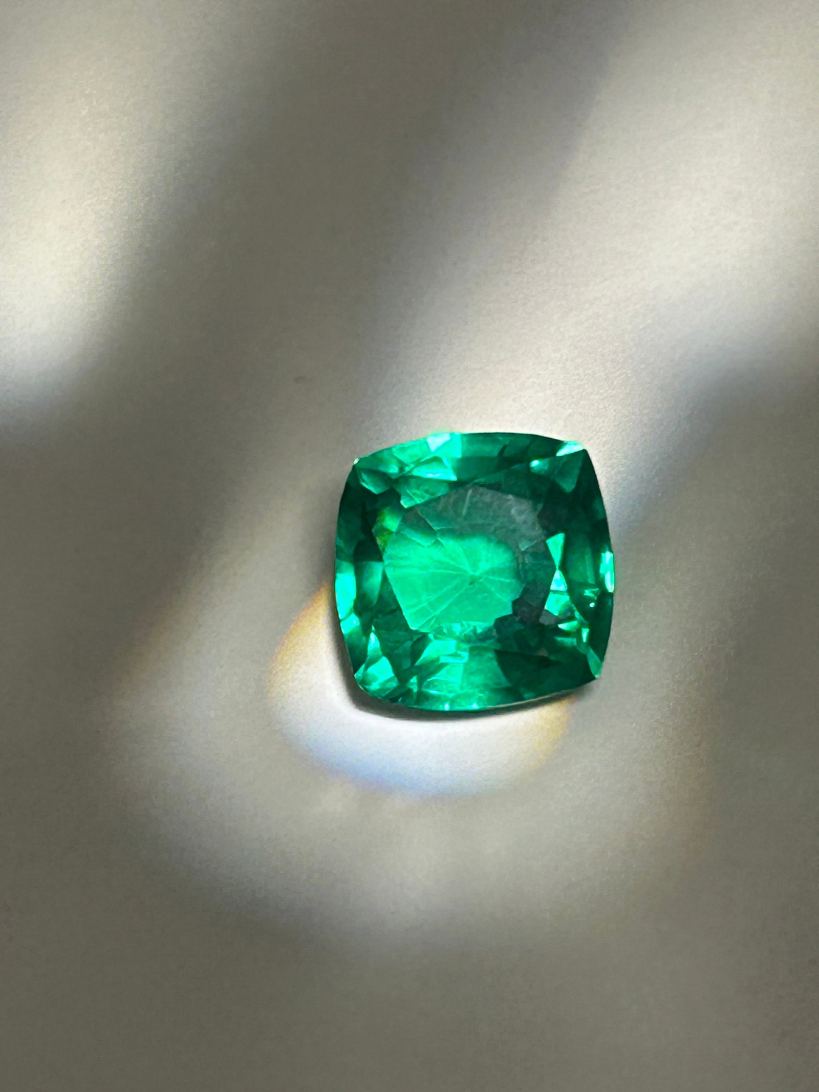 9 Carat --- Namibian Green Andradite Garnet --- Cushion Cut --- GGL Certified: Renowned for high brilliance, This stone is highly prized for it's high refractive index, which provides exceptional brilliance and "fire" (dispersion) that can exceed that of a diamond. Sources inclu