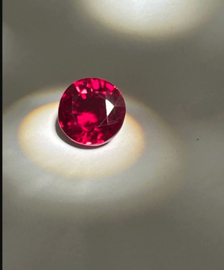 6.20 Carat --Mozambique Blood Ruby Round Brilliant Cut: Mozambique blood ruby is an exceptional, investment-grade gemstone characterized by a deep, vivid red hue, strong fluorescence, and high transparency. Featuring "pigeon’s blood" coloring, this stone