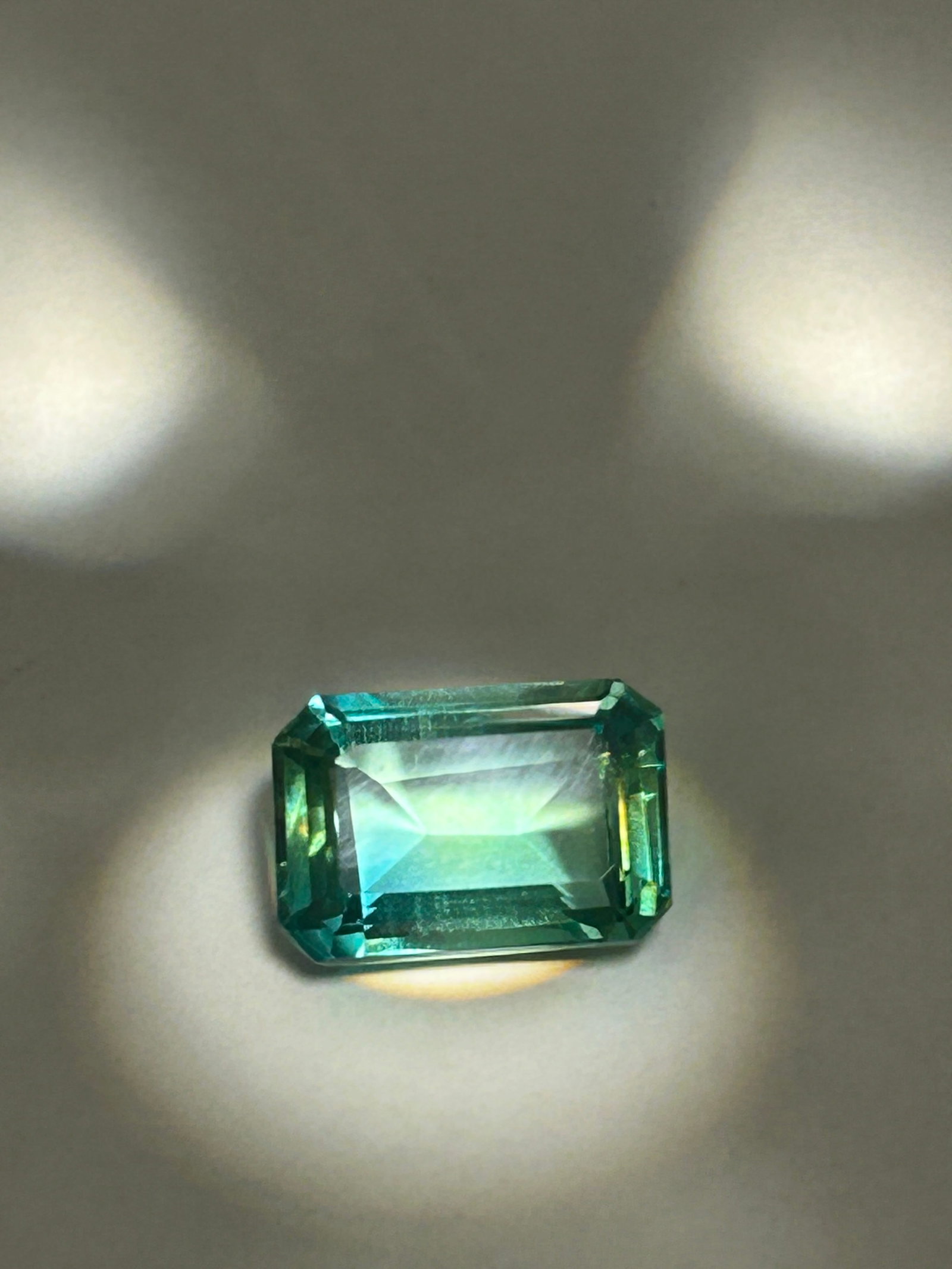 11.91 Carat ----Green Sapphire ----Emerald Step Cut ----LAB GROWN IGI Certified: 11.91 Carat ----Green Sapphire ----Emerald Step CutLab-grown sapphires are chemically identical to natural ones (\(Al_{2}O_{3}\)), typically grown using methods like Czochralski ("pulled") or Verneuil