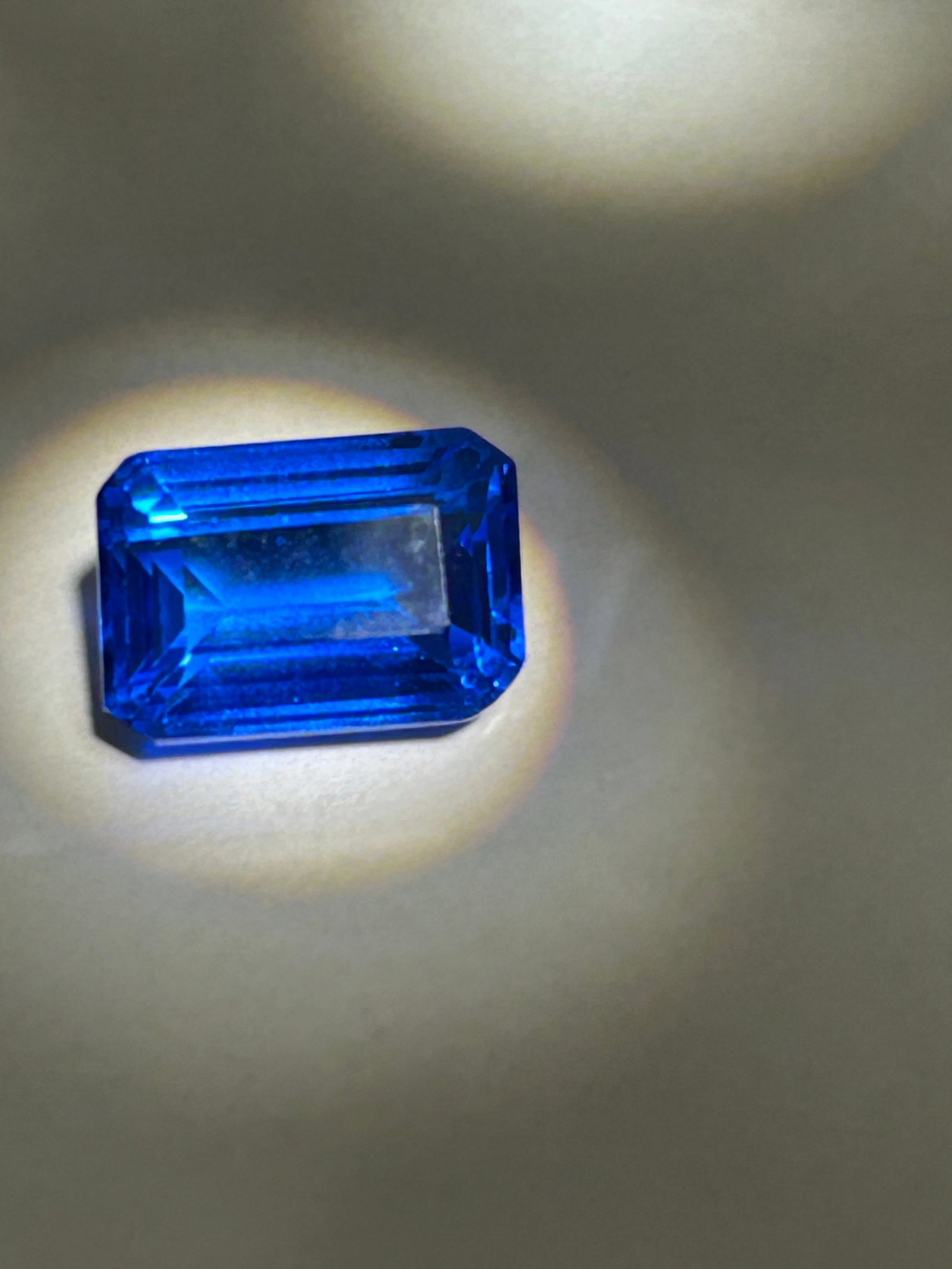 7.77 Carat ---- Cobalt Blue Spinel ---- Emerald Step Cut -- LAB GROWN IGI Certified: 7.77 Carat ---- Cobalt Blue Spinel ---- Emerald Step Cut -