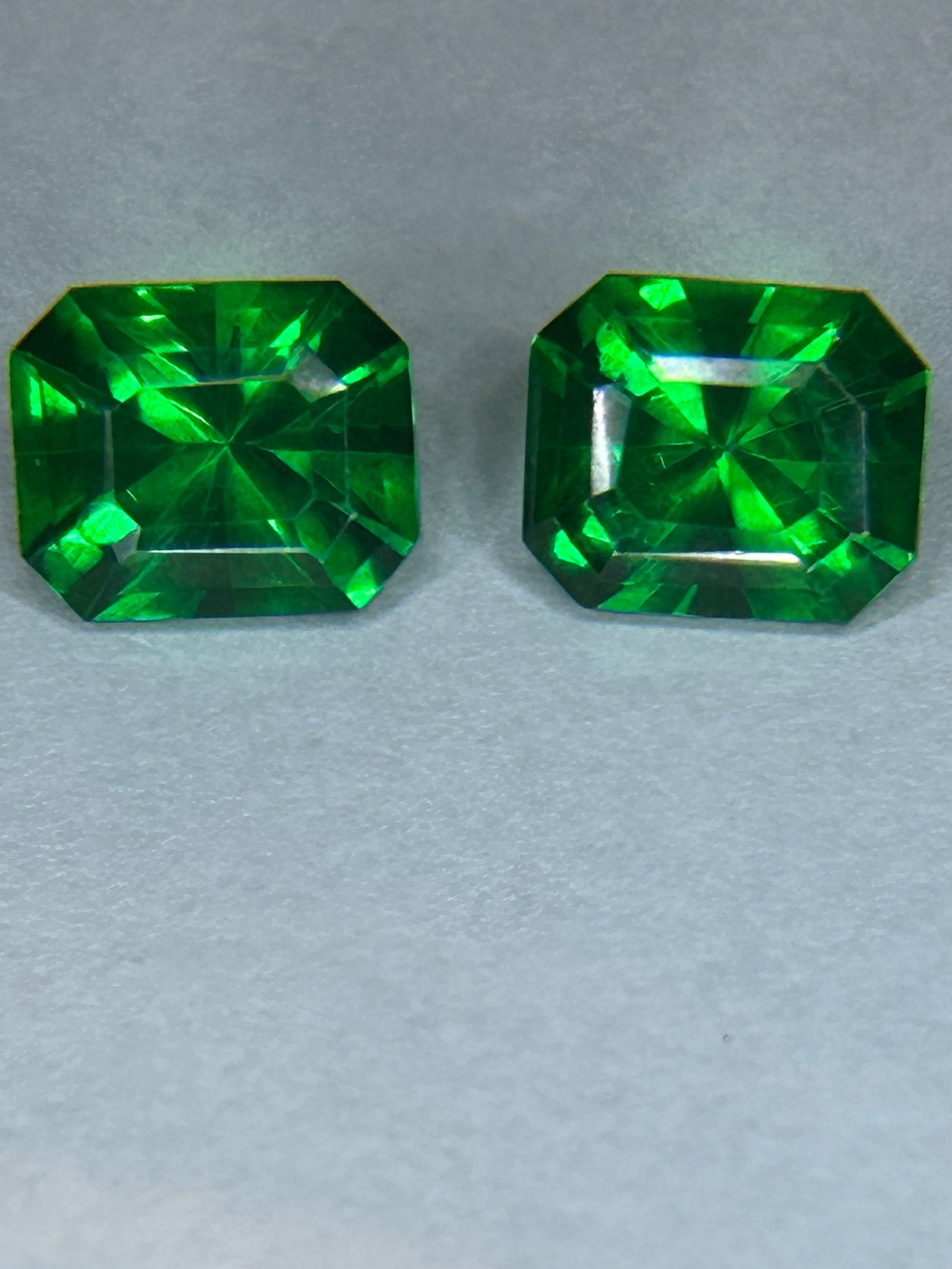 19.9 Carat --- Garnet -- Cushion Cut PAIR -- GIR Certified: Prized for its substantial size and vintage-inspired "pillow" shape. This set is used to create statement jewelry, such as large chandelier or drop earrings, due to their impressive presence.