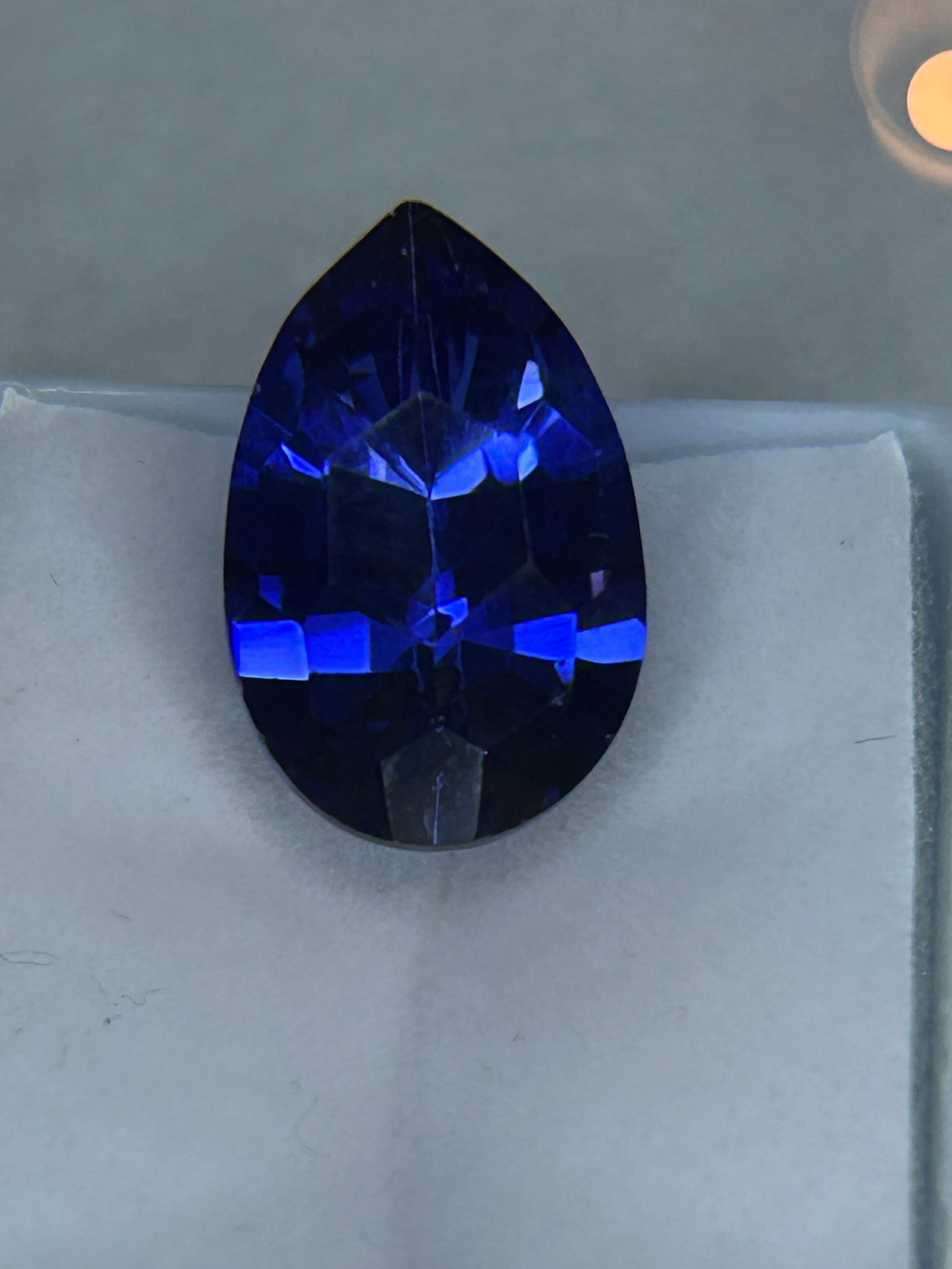 9.00 Carat --- San Benito Benitoite --- Pear Cut --- AGSL Certified: A 9.00-carat San Benito Benitoite with a pear cut is an extraordinary and significant gemstone, as gem-quality benitoite over 2 carats is considered extremely rare. Benitoite is the official Californi