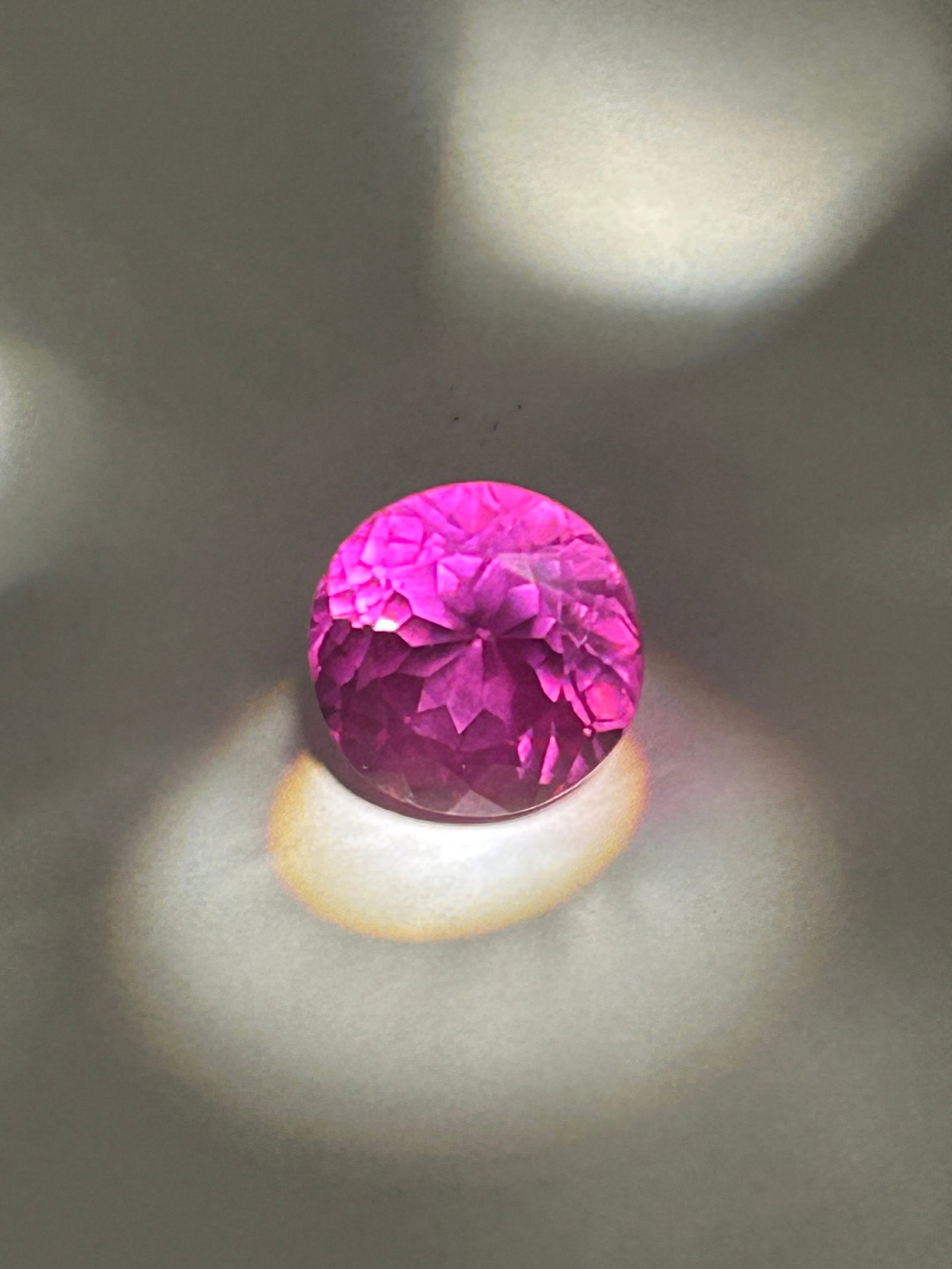11.50 Carat -- Sri Lankan Pink Sapphire -- Round Cut ---EGL Certified: a substantial, high-clarity, round-cut gemstone typically characterized by a vibrant pink hue and excellent brilliance, often sourced from the Ratnapura region. These natural,Ceylon sapphires are favo