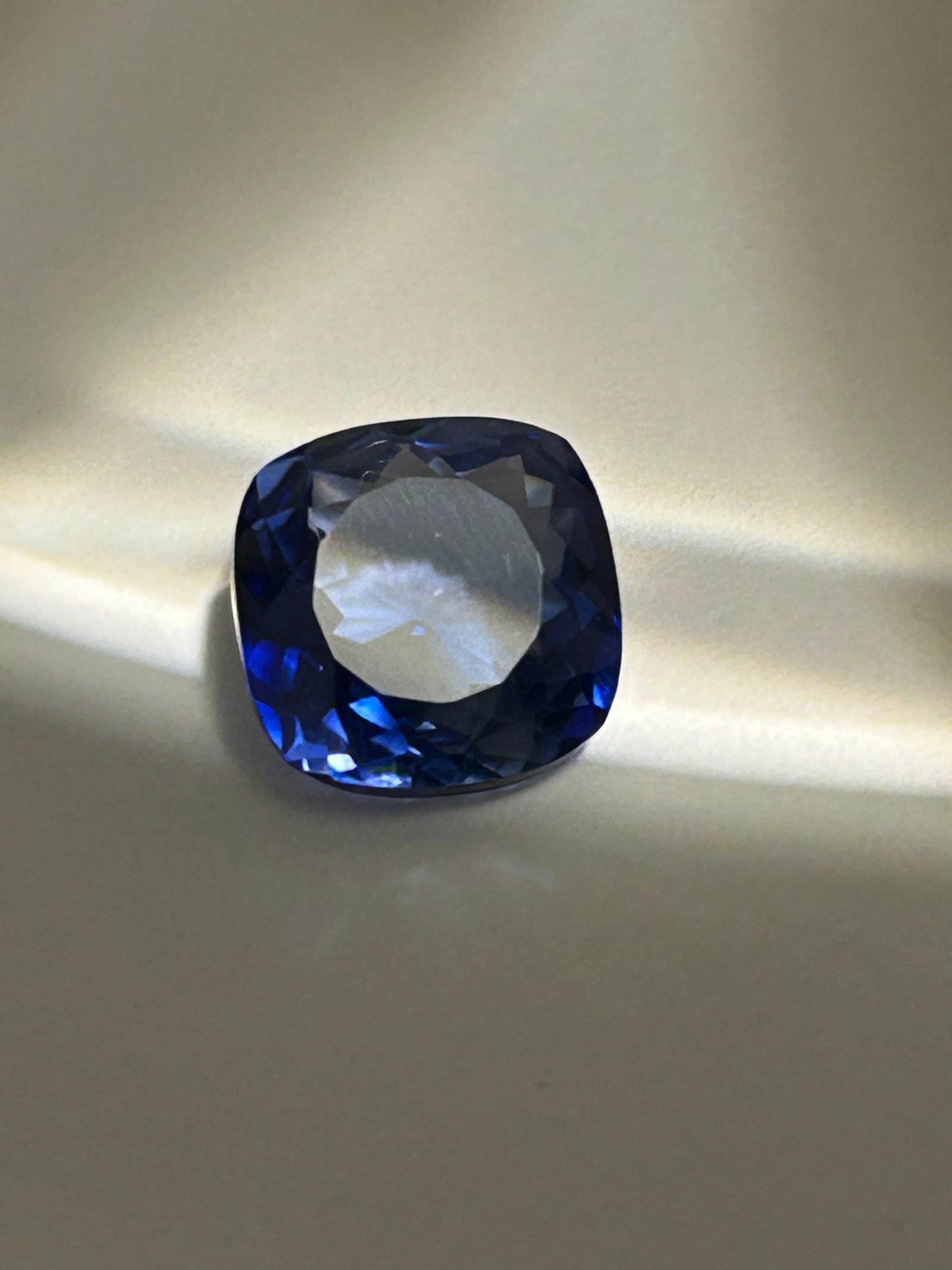 9.25 Carat --- Ceylon Blue Sapphire --- Cushion Cut ---- EGL Certified: A luxurious gemstone. It features a bright, luminous blue color, a soft-cornered square shape, and exceptional brilliance.