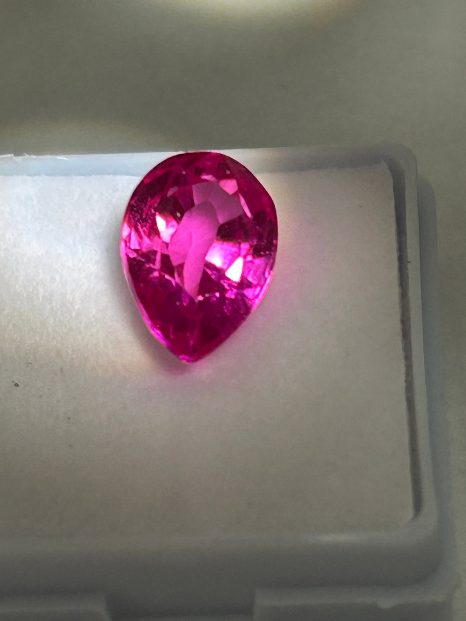4.50 Carat --- Ceylon Pink Sapphire --- Pear Cut --- GGI Certified: A high-value, pear-cut gemstone originating from Sri Lanka, featuring a vibrant, intense pink or purplish-pink hue. Renowned for exceptional clarity and brilliance, these stones are frequently untreat
