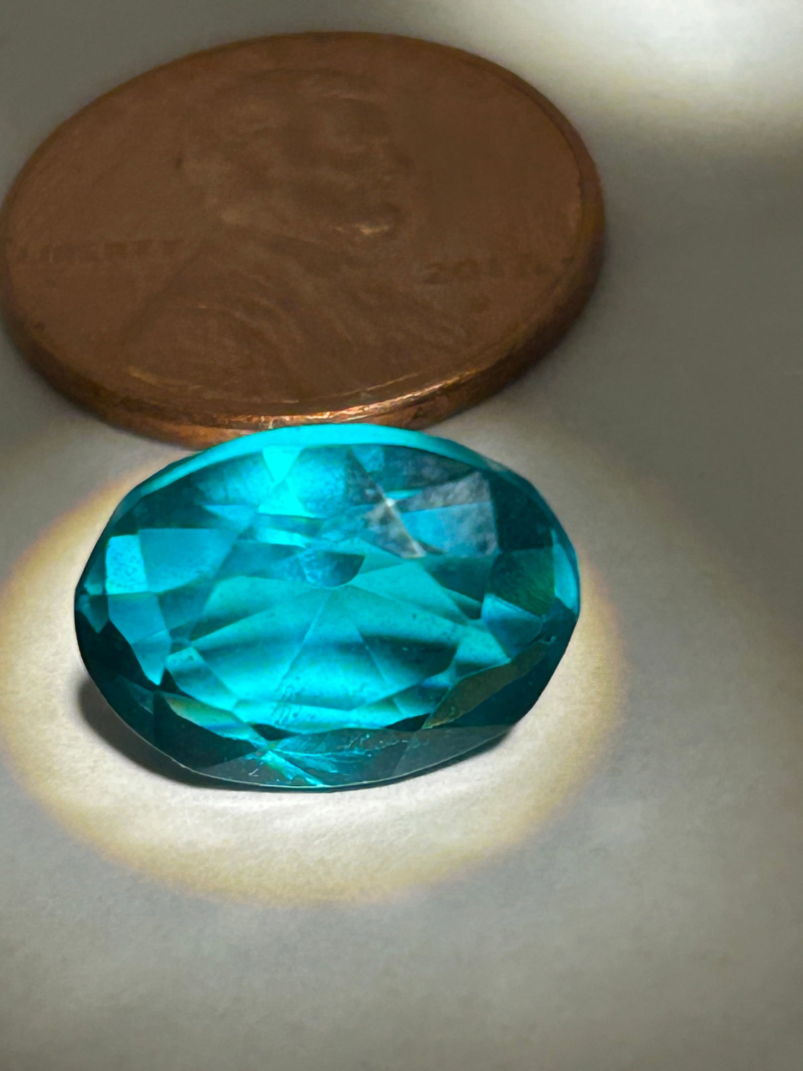 13 Carat --- Ceylon Green Sapphire --- Oval Cut --- EGL Certified: Prized for its origin in Sri Lanka. Such a large,, high-clarity stone is considered exceptional and used for luxury jewelry pieces like pendants or statement rings.