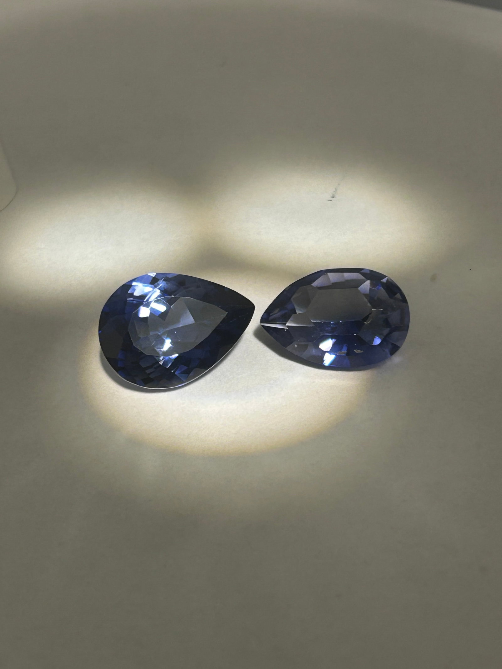 20.00 Carat --- Blue Sapphire --- Pear Cut PAIR --- VG Certified: Transparent with a vibrant blue color, cut into a teardrop shape with a rounded base and tapered tip. They are frequently described as natural Ceylon or Ceylon-type, offering excellent clarity and spa