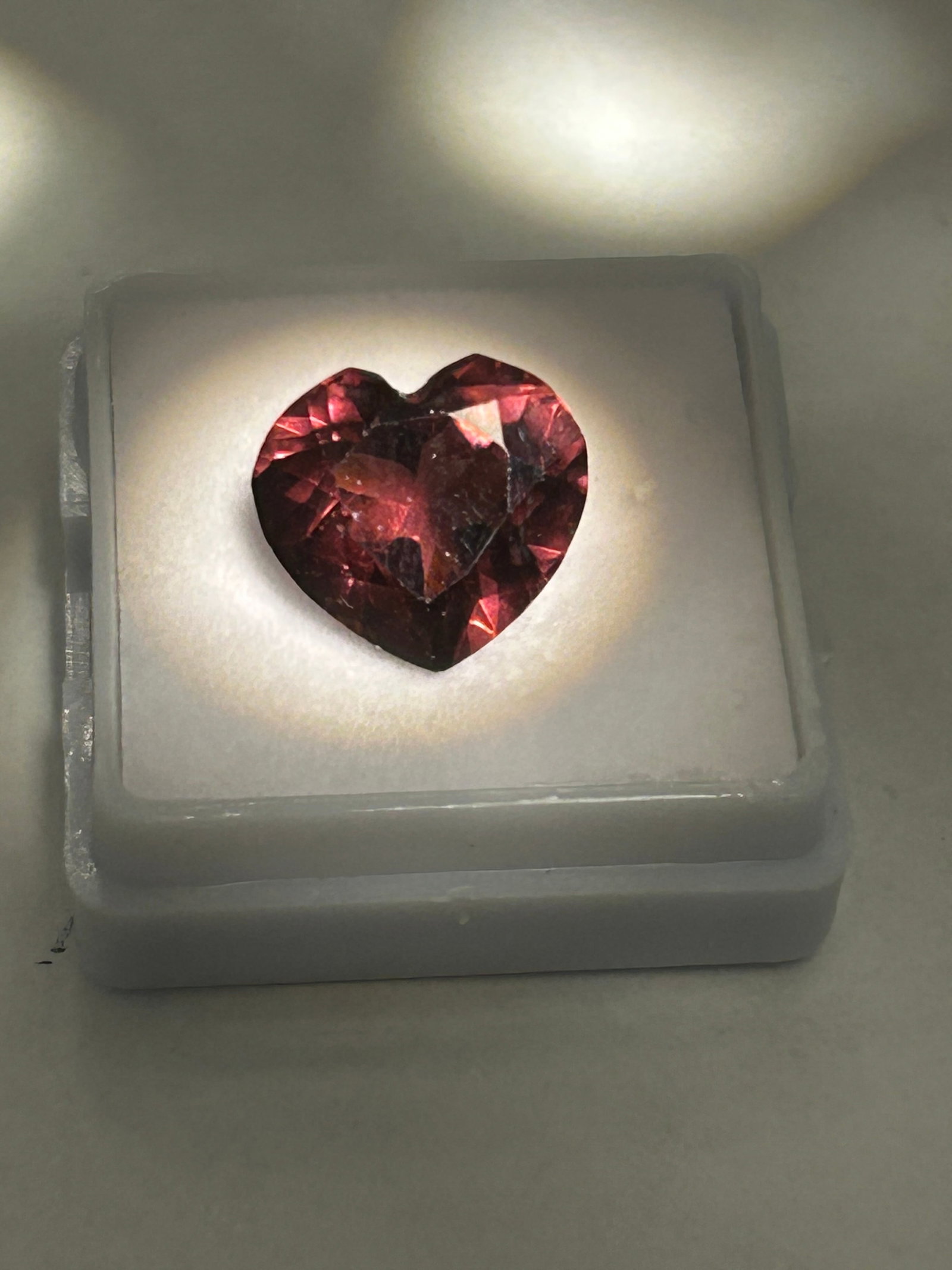 10.40 Carat --- Cambodian Cinnamon Sapphire --- Heart Cut ---- VG Certified: A heart cut is an exceptionally rare, large gemstone characterized by a warm, spicy reddish-brown or orangey-brown color. Sourced from Cambodia, known for rich, deep-toned zircon and sapphire deposits