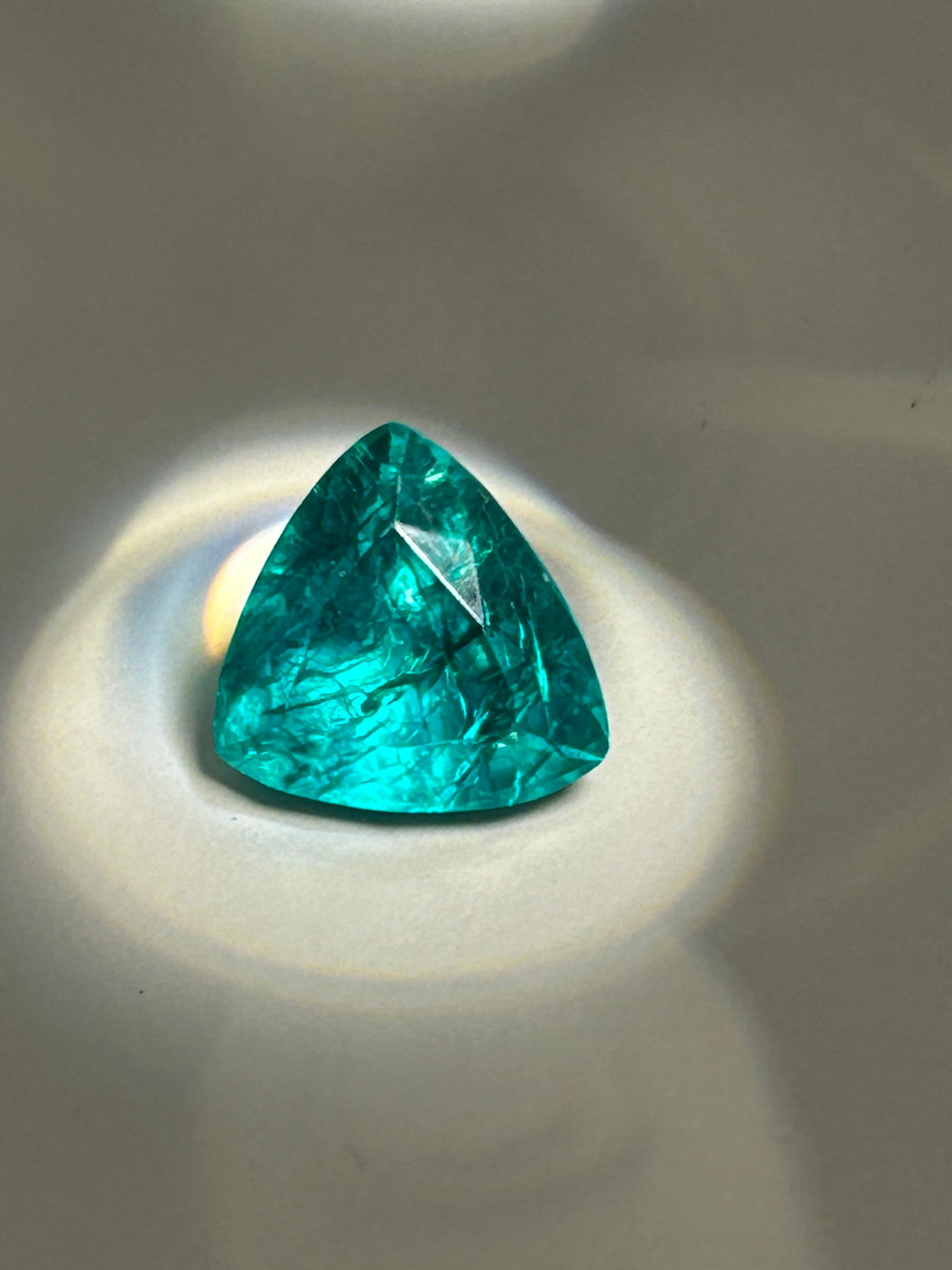 8.50 Carat --- Colombian Green Emerald --- Trillion Cut --- EGL Certified: A striking gemstone. Its unique triangular shape paired with its coveted geographic origin creates a brilliant, vibrant display of color and fire.