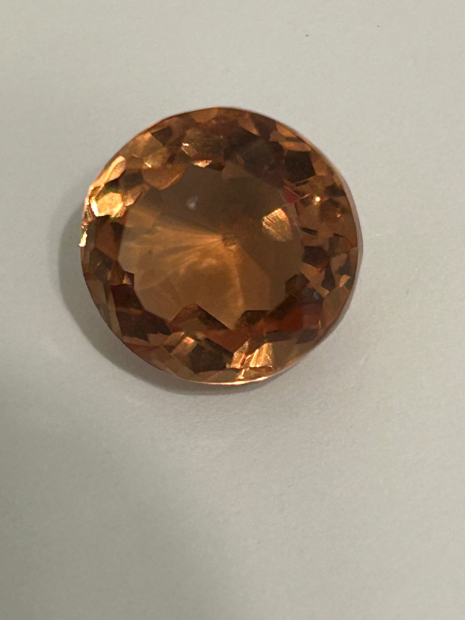 4.25 Carat --- Ceylon Color Changing Alexandrite--- Round Cut --- GGI Certified: Sri Lankan alexandrites are famous for their transparency, but their chemical makeup gives them distinctly yellowish-brown appearance in daylight that shift to yellow-brown.