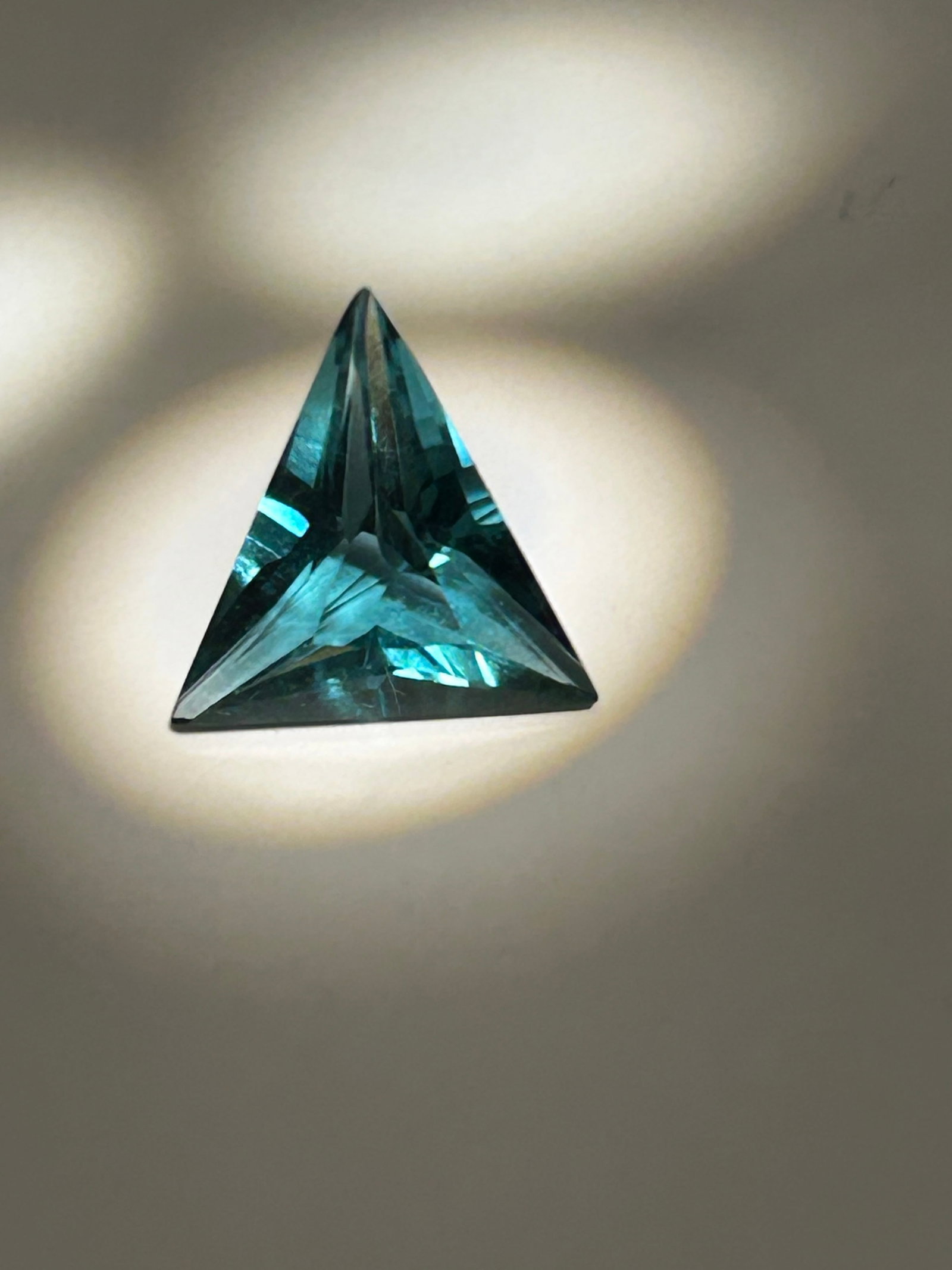 8.60 Carat --- Ceylon Green Sapphire --- Fancy Trillionl Cut --- EGL Certified: A striking gemstone. Sourced from Sri Lanka (historically known as Ceylon), it combines exceptional durability with a luminous, triangular shape.