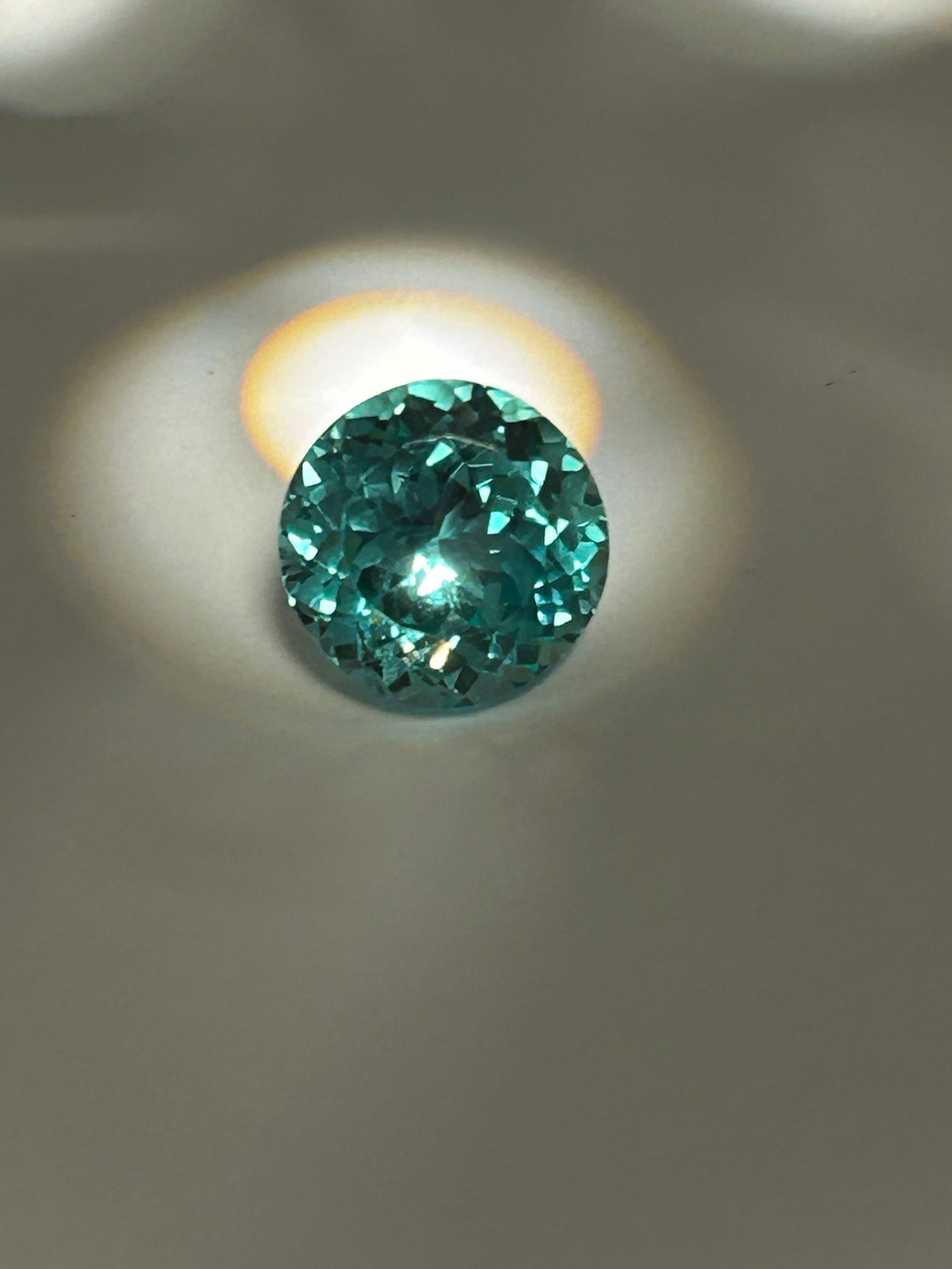 10.00 Carat --- Ceylon Green Sapphire--- Round Cut --- EGL Certified: Hailing from Sri Lanka, it is prized for its soft, brilliant, and highly luminous color. Because natural sapphires of this size are rare, such a stone commands significant value in fine jewelry.