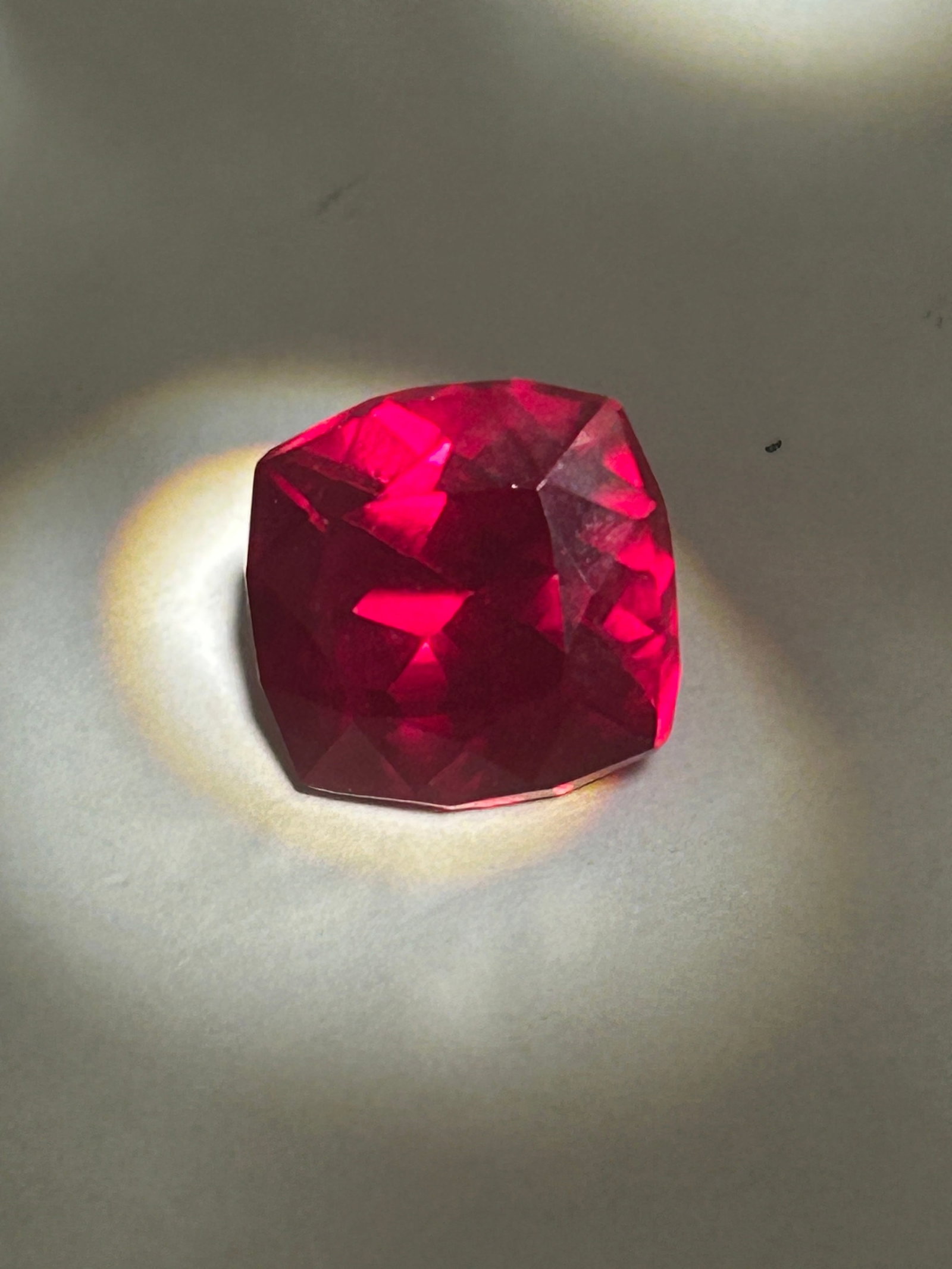 8.22 Carat --- Mozambique Red Ruby --- Cushion Cut--- EGL Certified: Mozambican stones of this size are highly prized for their vibrant, highly saturated red color, excellent clarity, and strong fluorescence. Depending on its specific color grading and treatments, this