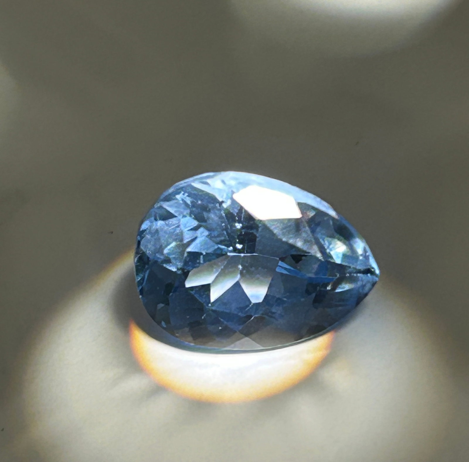 10.70 Carat --- Brazilian Aquamarine --- Pear Cut --- EGL Certified: A 10.70-carat Brazilian aquamarine in a pear cut is a large, striking gemstone that highlights the ocean-blue hues and excellent clarity signature to Brazilian beryl. Its substantial weight makes it a