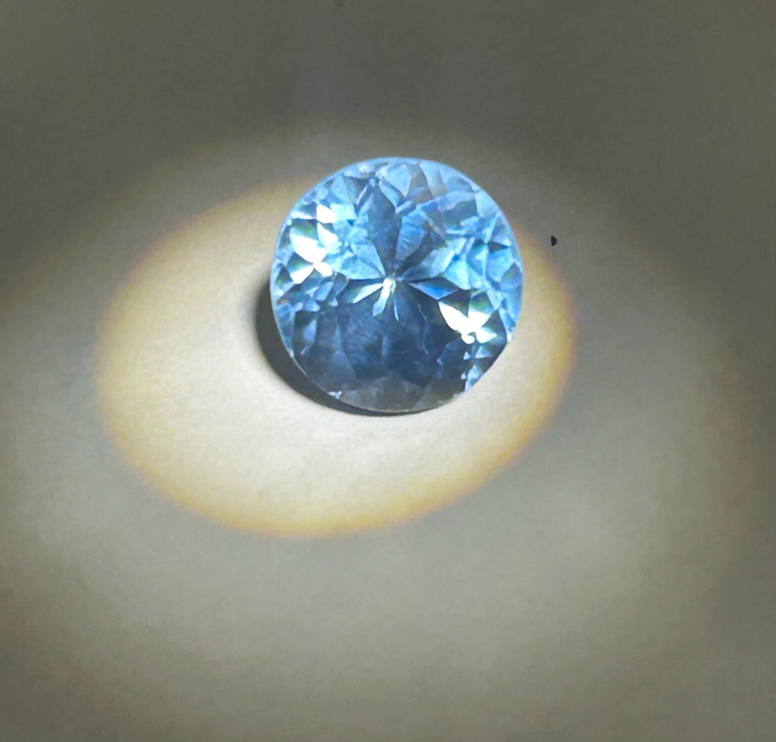 4.02 Carat --- Light Blue Spinel --- Round Cut: This size makes a striking centerpiece. The round cut maximizes its brilliance and icy-aqua fire, while natural light blue varieties—sourced from Sri Lanka are prized collector's items.