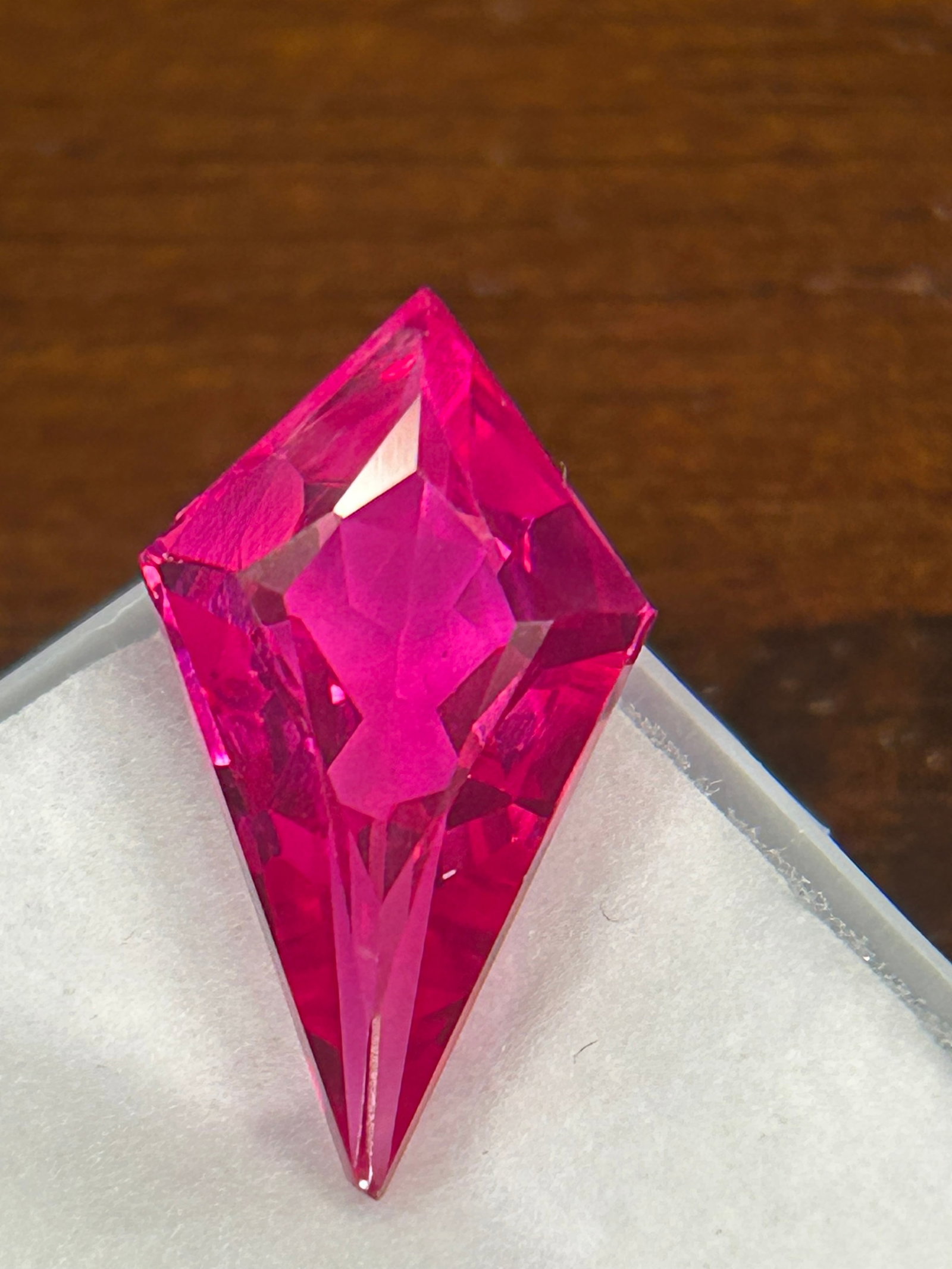 7.60 Carat ---- Ceylon Pink Sapphire ---- Fancy Cut: A substantial, rare, and striking gemstone. These are often described as having a vibrant, intense pink hue, frequently originating from Ceylon and designed with unique, non-traditional shapes to maxi