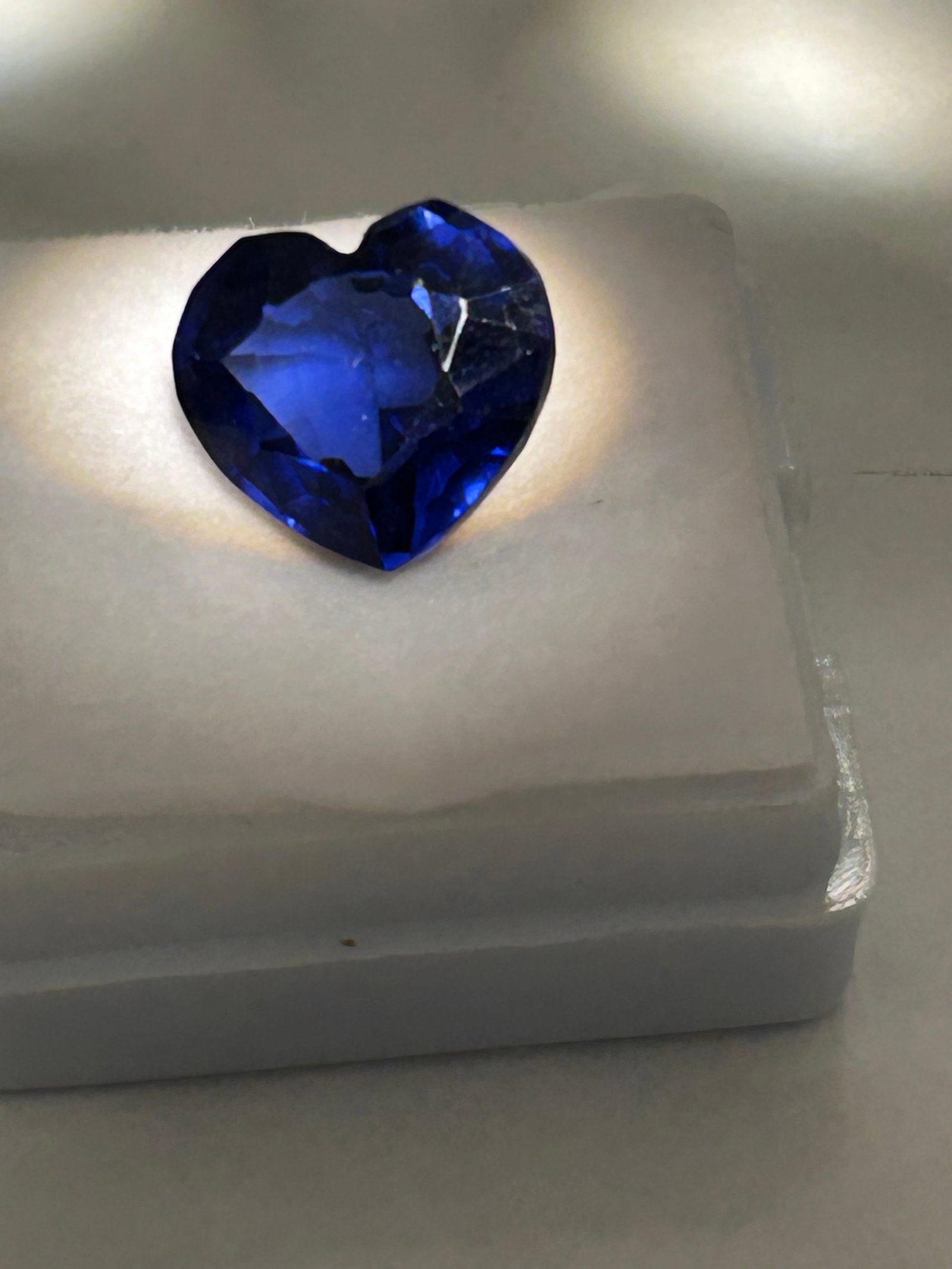 9.60 Carat --- Blue Tanzanite --- Heart Cut: A romatic heart-cut, sourced from Tanzania. This gemstone is characterized by vivid violet blue hues. This stone shows intense coloration, eye-clean clarity. Deep blue with velvety violet undertones, 