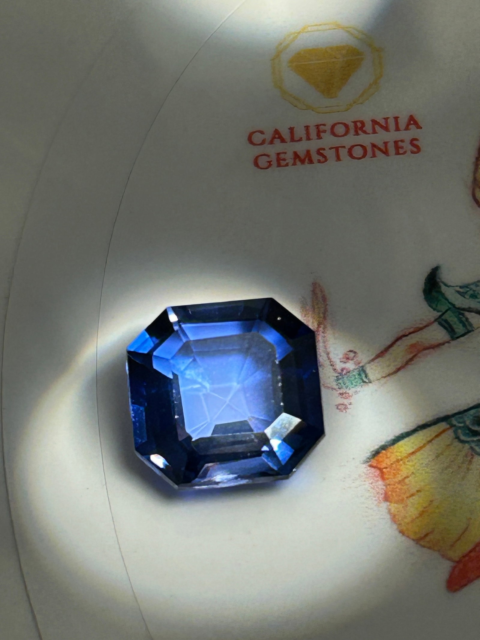 8.8 Carat ---- Sri Lankan Blue Sapphire ----- Asscher Cut: Historically prestigious gemstone. It pairs the bright, vivid cornflower or royal blue hues for which Ceylon sapphires are famous with the architectural, mirrored "hall of fame" step-facets of an Assc