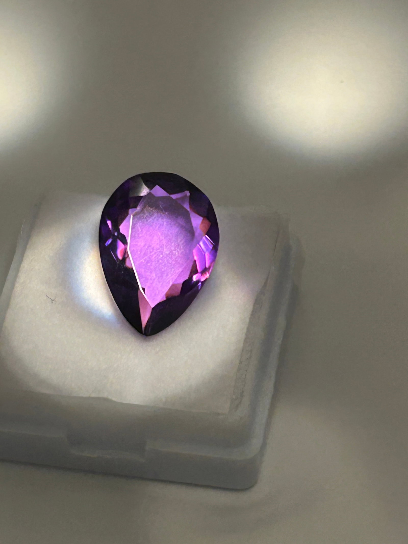 7.45 Carat--- Purple Tanzanite ---- Pear Cut---GGL Certified: A highly coveted gemstone. Features a triangular shape with excellent brilliance and a rich, color, described as a "masterpiece" or "collector's piece" suitable for a statement ring or pendant, showca