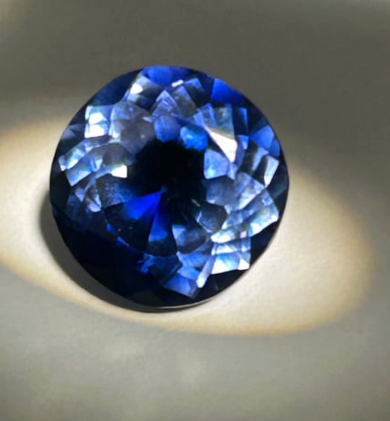 12.20 Carat ---Tanzanite --- Round Cut --- EGL Certified: Stones of this size and quality are often listed as "IF" (Internally Flawless) or eye-clean, indicating no visible inclusions. Outstanding color saturation, clarity. An intense "violetish blue" color.