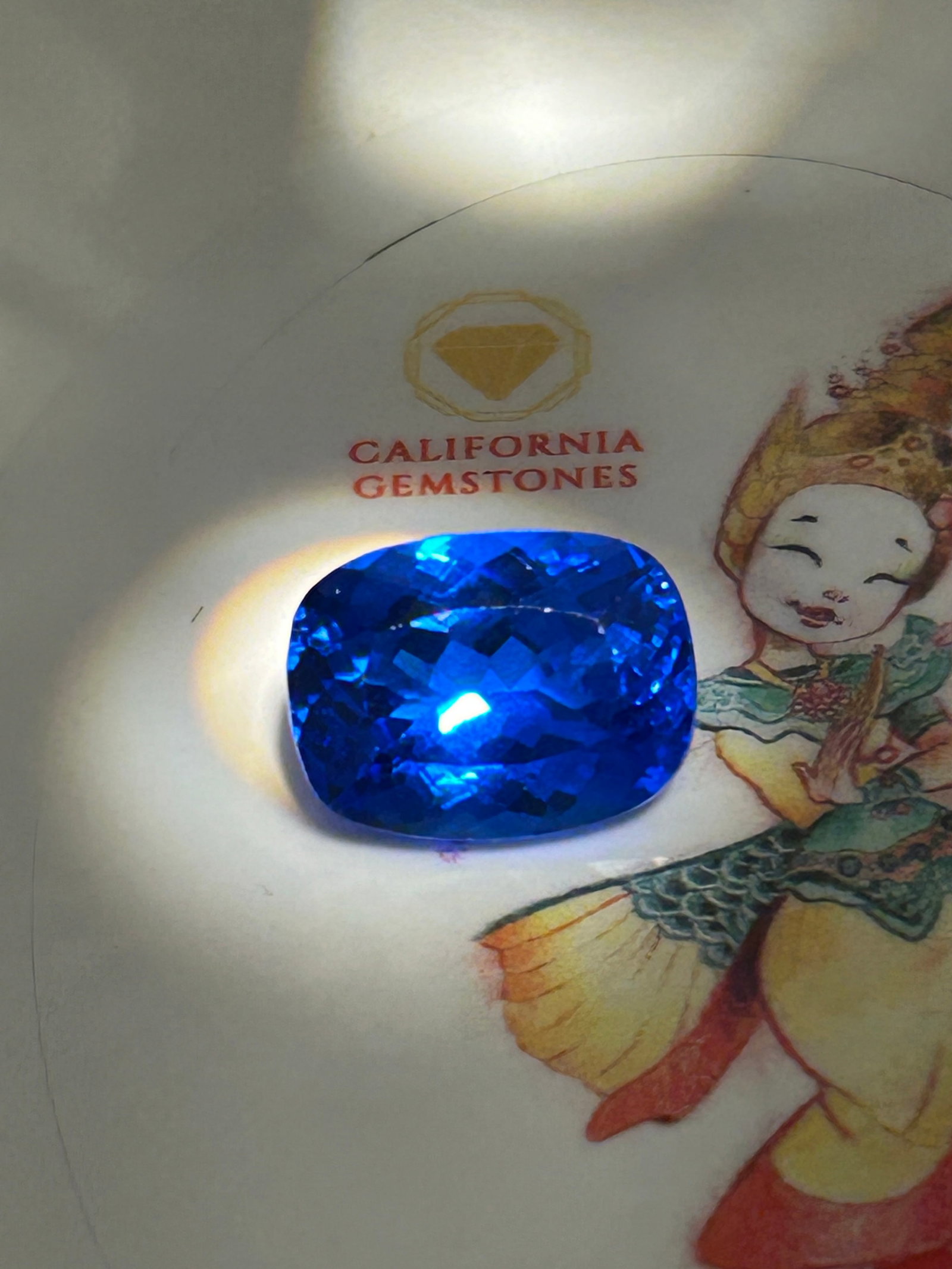 11.35 Carat -- Cobalt Blue Spinel-- Modified Cushion Cut: An 11.35-carat Cobalt Blue Spinel is an exceptionally large, rare, and high-value collector's gemstone. Colored by trace amounts of cobalt, its modified cushion cut—with rounded corners and brillian