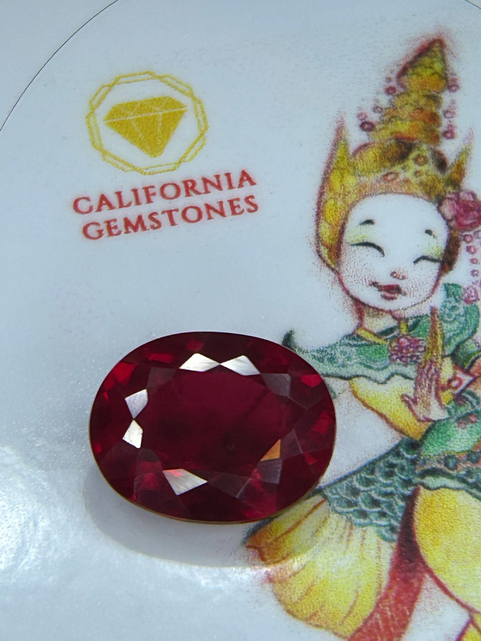 9.11 Carat --- Blood Red Ruby ---Oval Mixed Cut- IGI Certified: A striking gemstone. The "Blood Red" designation, a vivid, saturated pure red hue with delicate undertones. Paired with an oval mixed cut, it creates a stunning display of color and brilliance.