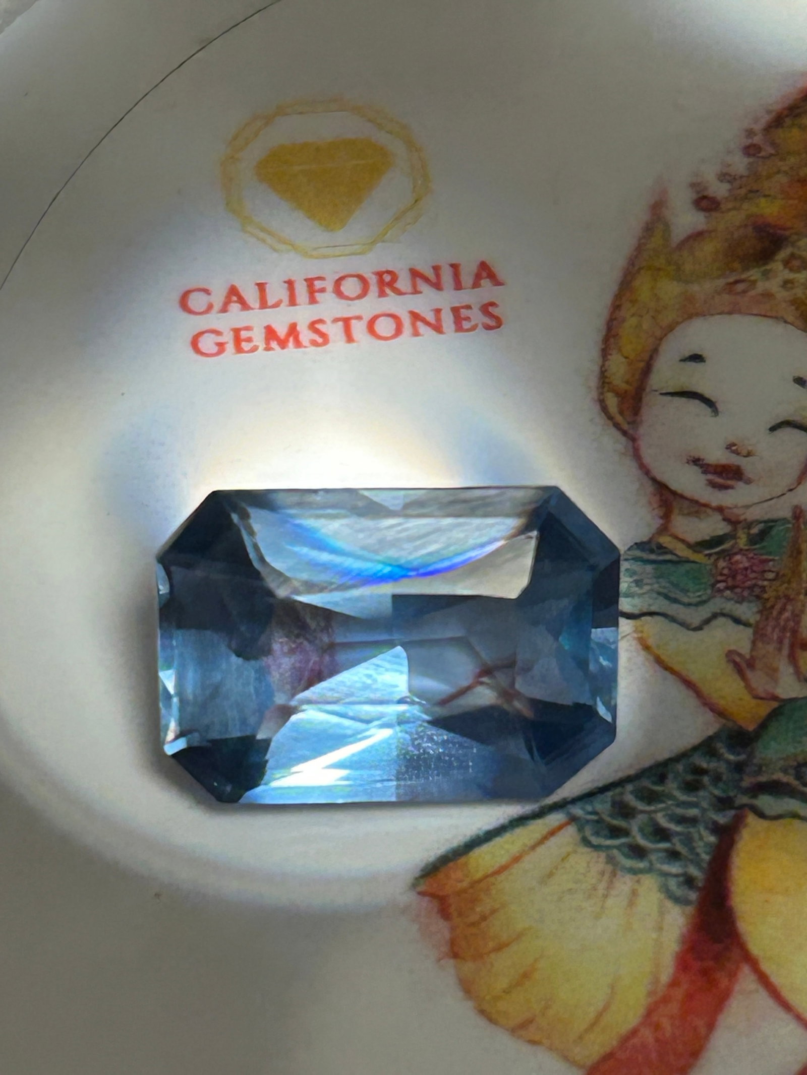 9.95 Carat --Brazilian Aquamarine ---Emerald Step Cut----EGL Certified: An investment-grade gemstone boasting a stunning vivid blue to sea-blue color. Cut in a classic emerald step cut, the gem features long, clean lines that maximize its natural transparency and give it 