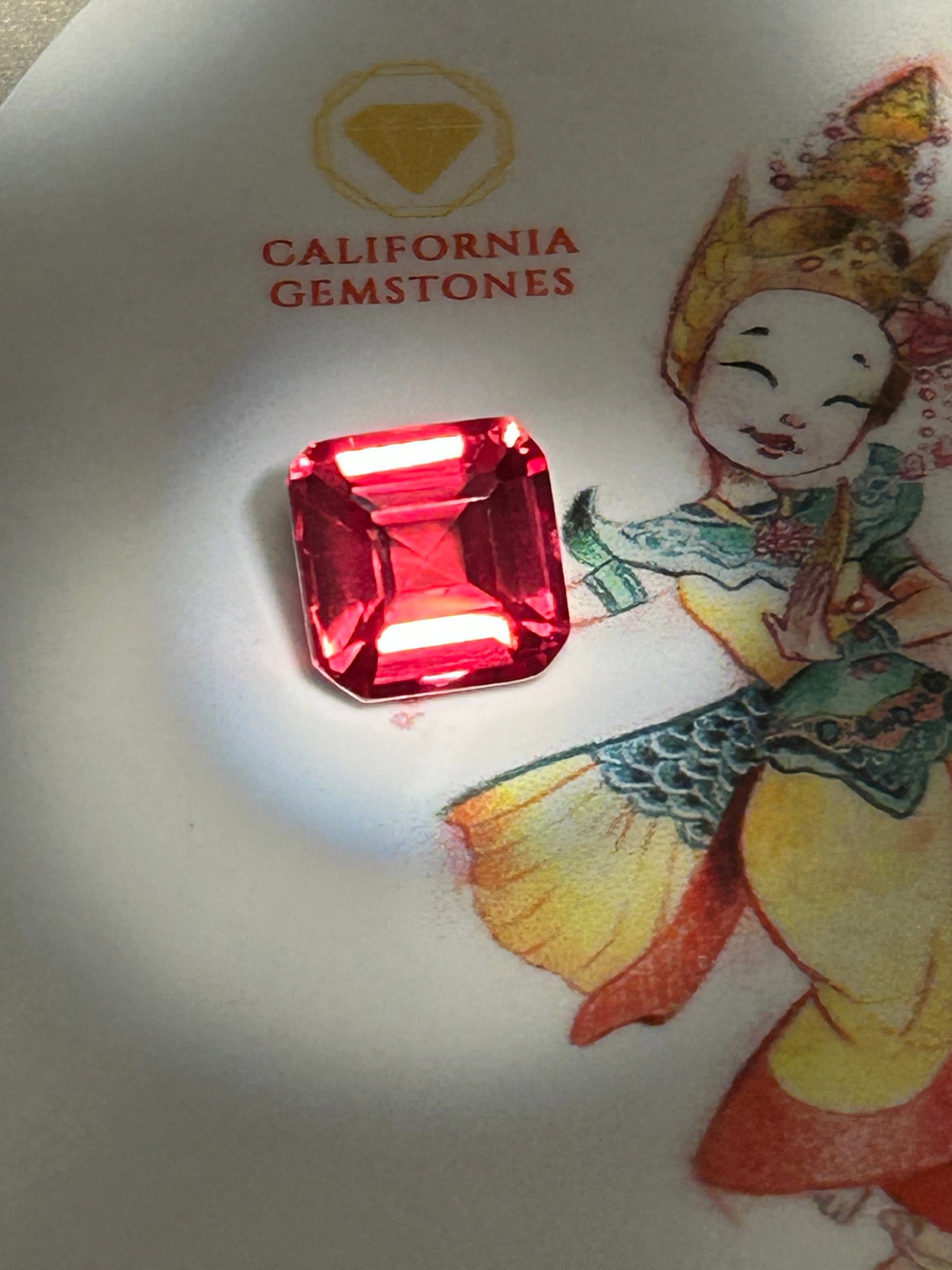 5.95 Carat -- Natural Orange Opal Doublet-- Asscher Cut--- EGL Certified: a vibrant, custom-cut composite gemstone. It features a thin, polished slice of genuine natural opal bonded to a dark backing to enhance its fiery orange color. Cut into a precise Asscher shape, it de