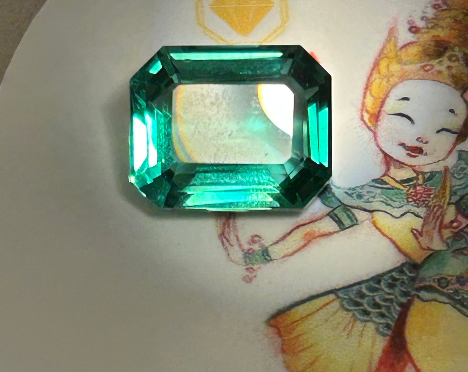 11.90 Carat -- Natural Green Sapphire-- Emerald Step Cut--- EGL Certified: A sizable gemstone. Cut in an emerald step-cut, it highlights exceptional clarity, color-play, and high durability, making it a highly valuable centerpiece for a custom cocktail ring or pendant rather