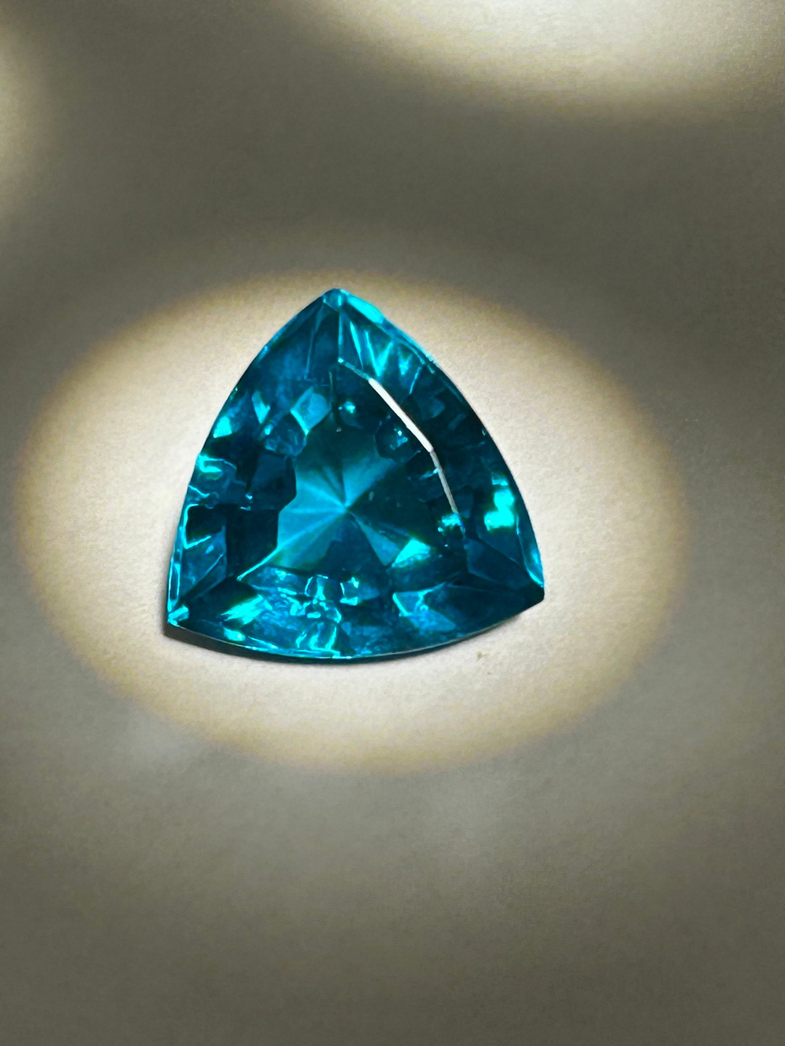 10.10 Carat -- Natural Brazilian Teal Tourmaline -- Trillion Cut --- GGL Certified: A High clarity and striking gemstone, characterized by its deep blue-green color, triangular shape, and high-energy sparkle. These stones, frequently sourced from Brazil showcase strong pleochroism, s