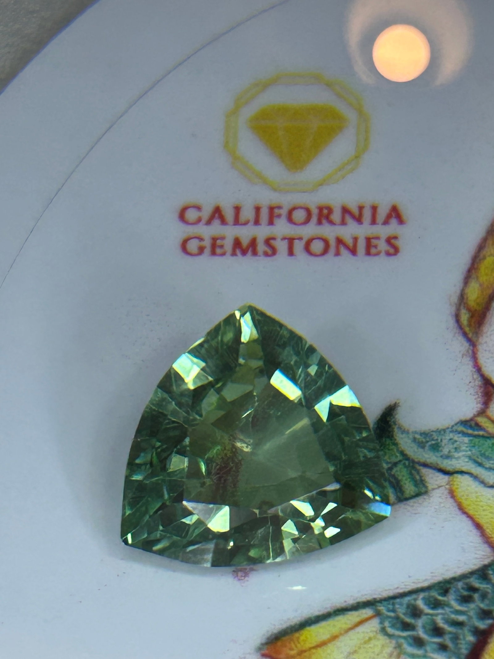 8.0 Carat Natural Brazilian Tourmaline Trillion Cut EGL Certified: Natural tourmaline, historically and famously sourced from the mineral-rich pegmatites of Brazil. Highly faceted to disperse light,featuring a modified brilliant trillion cut.