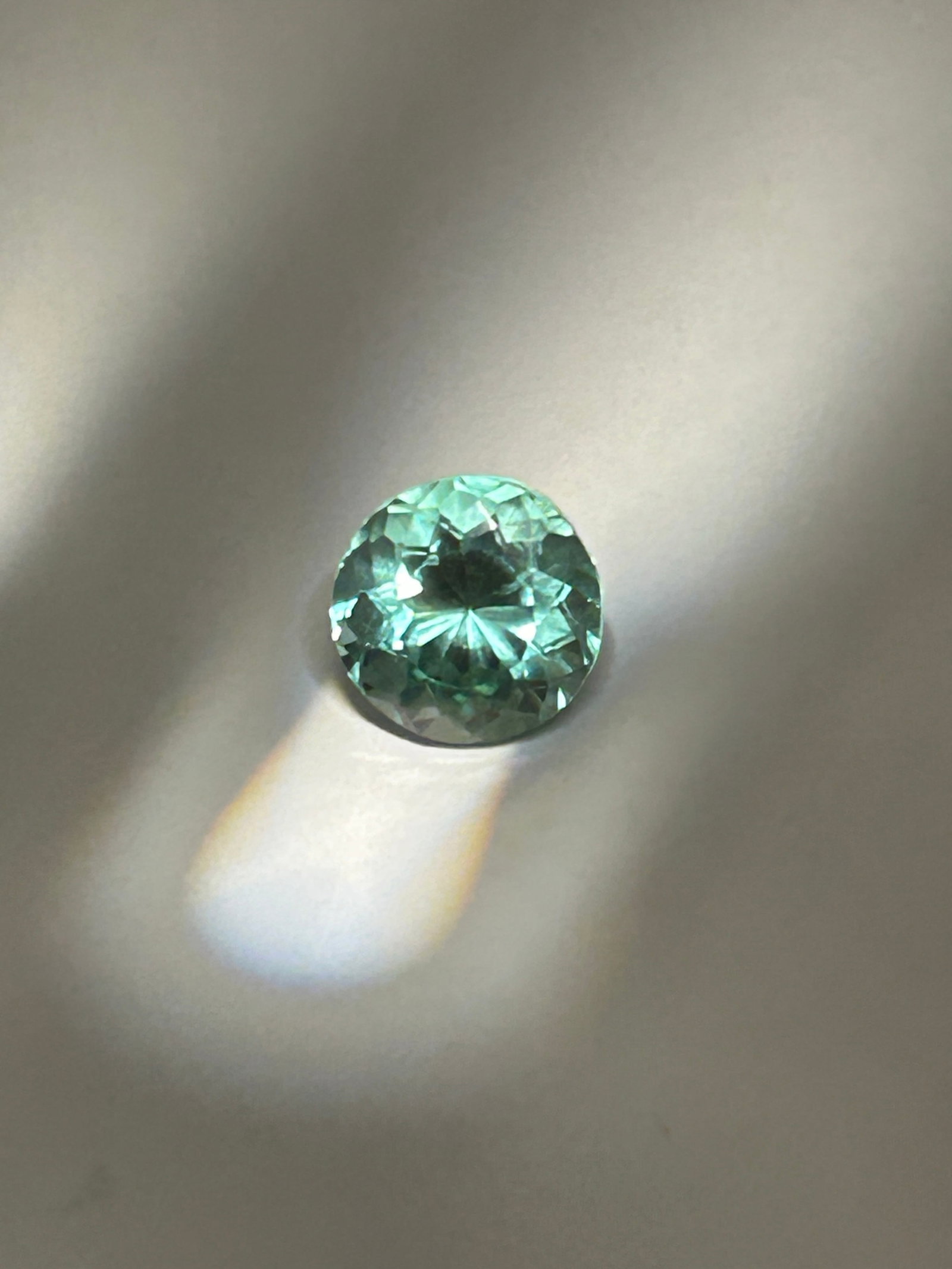 6.35 Carat --- Natural Namibian Light Green Tourmaline --- Round Cut --- EGL Certified: Namibian tourmaline is a high-clarity, and bright, vibrant gemstone often displaying neon mint hues. Namibian material is renowned for its high quality and, when cut in a round shape, displays superio