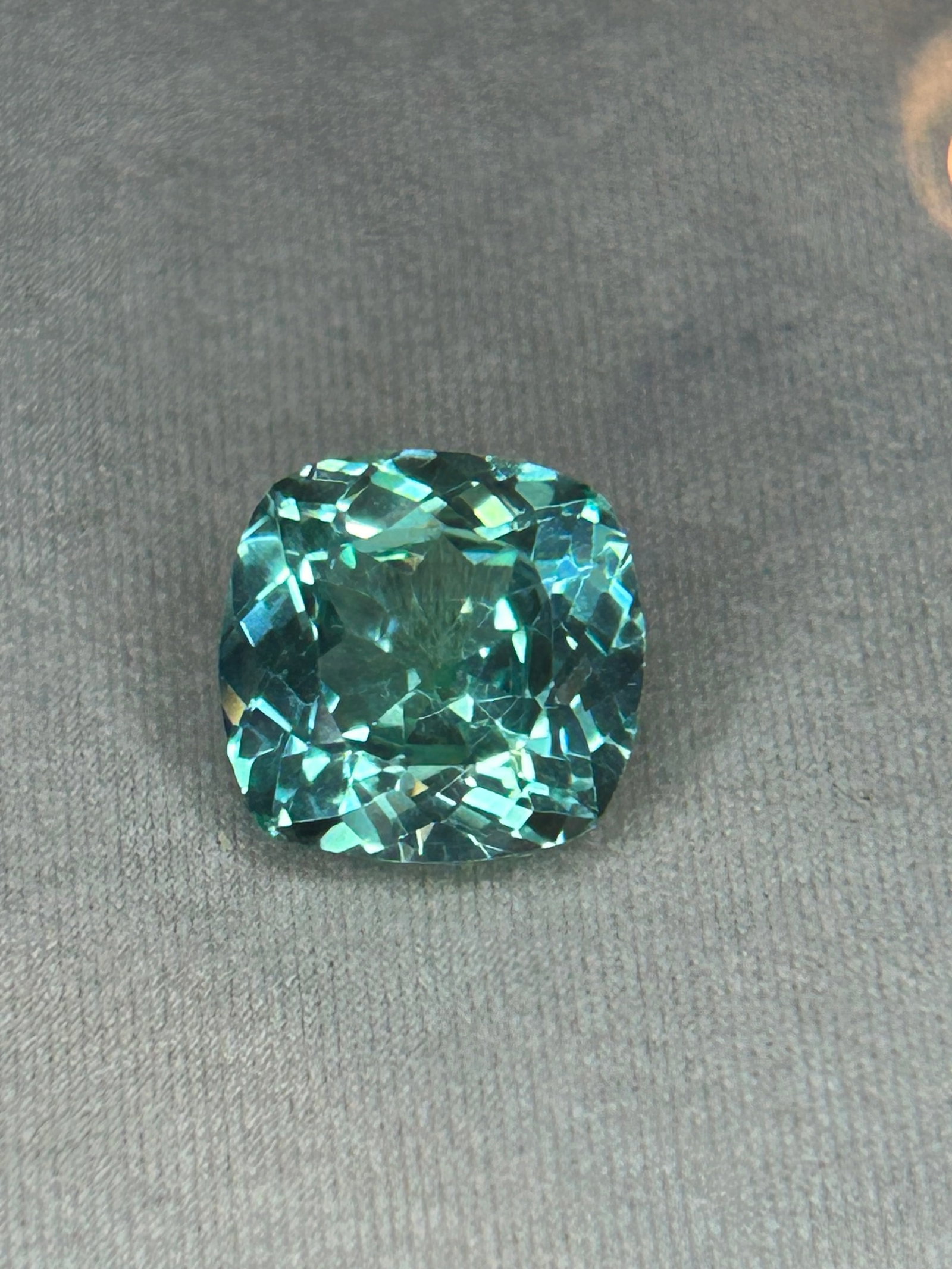 8.05 Carat -- Natural Green Sapphire -- Cushion Cut--- AGL Certified: The cushion cut maximizes its brilliance while softening the color, giving the gem a radiant, lively, and luxurious presence well-suited for a bold statement ring or heirloom pendant.