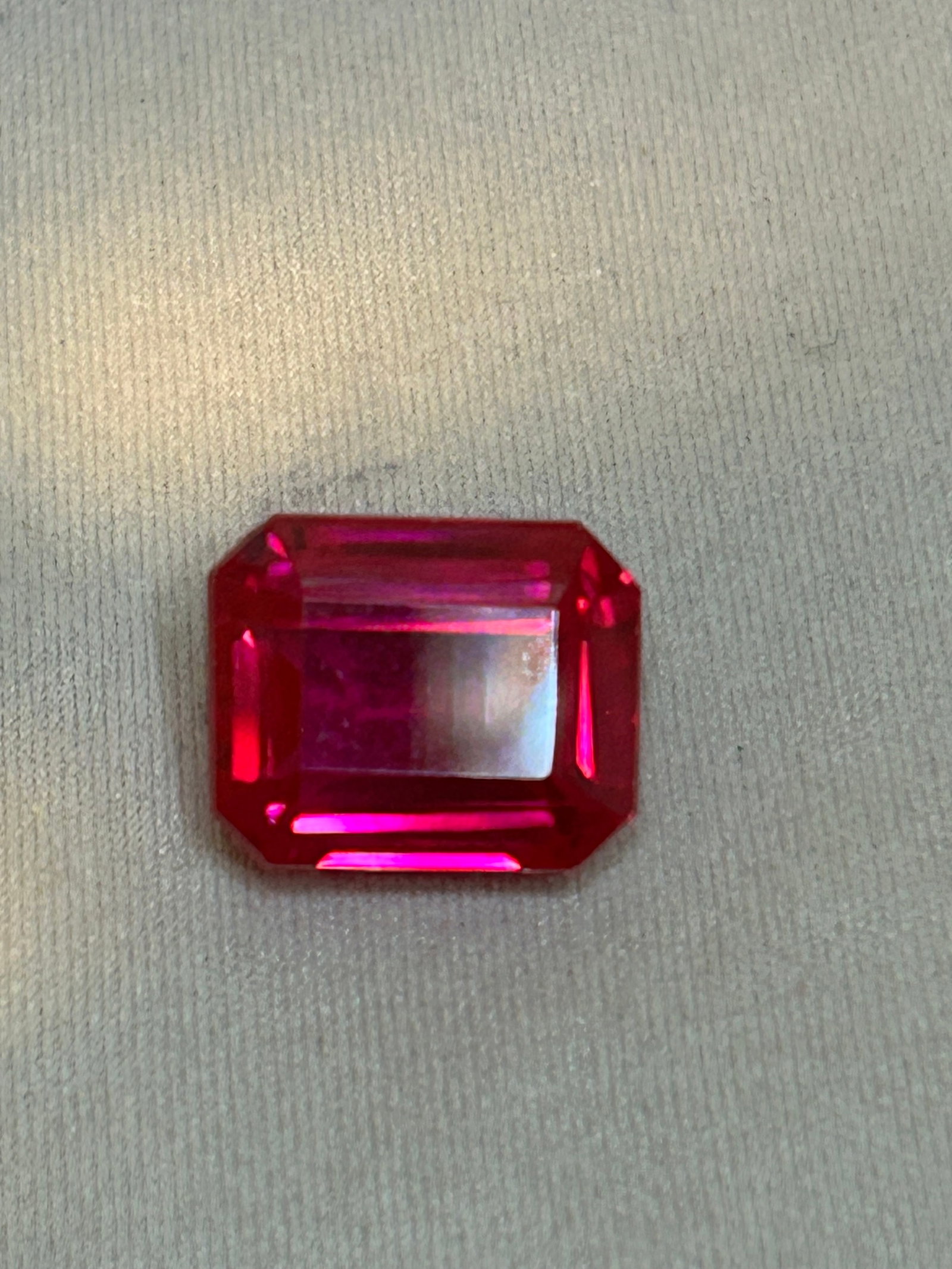 12.55 Carat -- Natural Ceylon Pink Sapphire -- Emerald Step Cut--- Certified: Prized for its elegant rectangular silhouette and step facets, it trades sparkle for an emphasis on pure color and internal clarity. It is a stunning centerpiece for heirloom, custom-made jewelry.