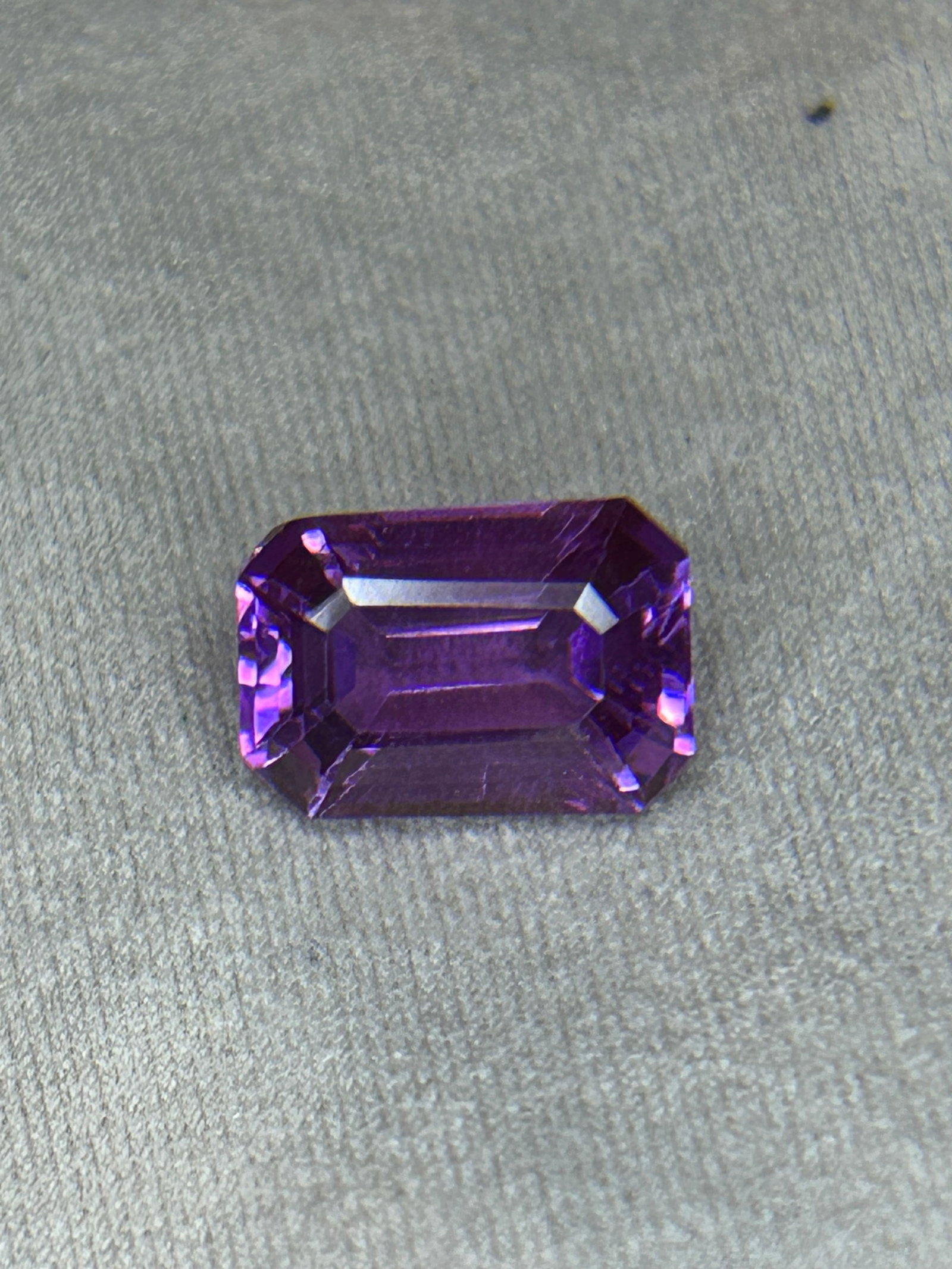4.65 Carat ---- Natural Boysenberry Sapphire---- Emerald Cut --- AGL Certified: Emerald Cut is a rare, premium-grade collector's gemstone. This unique gem combines substantial carat weight with a highly distinctive color profile and a classic, sophisticated facet pattern.