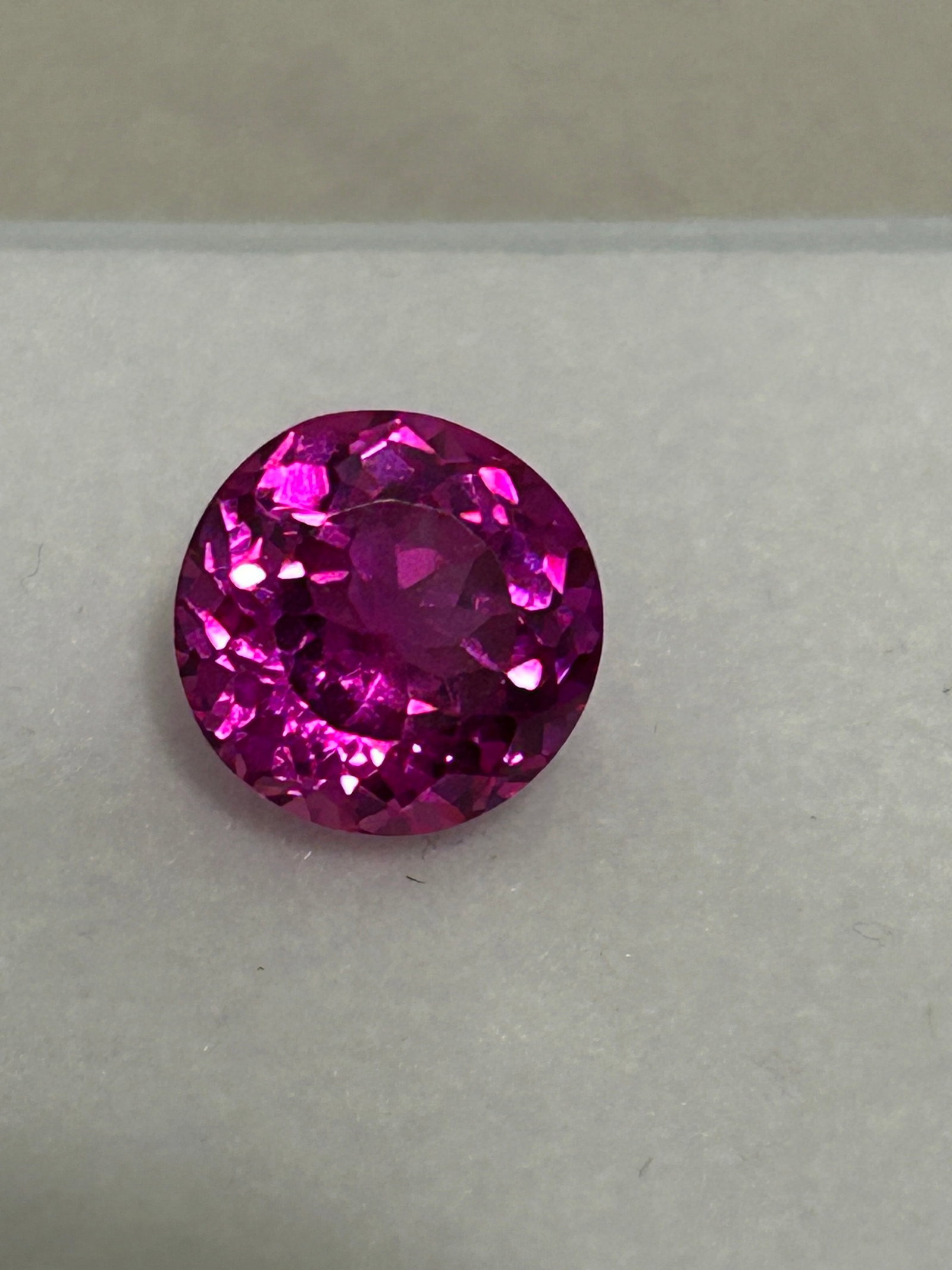 5.40 Carat ---- Natural Mozambique Raspberry Rhodolite---- Round Cut ---- ASGL Certified: Mozambique Raspberry Rhodolite, a highly coveted, naturally unheated gemstone. Valued for its intense color saturation and exceptional brilliance, this size is considered a substantial "statement" gem