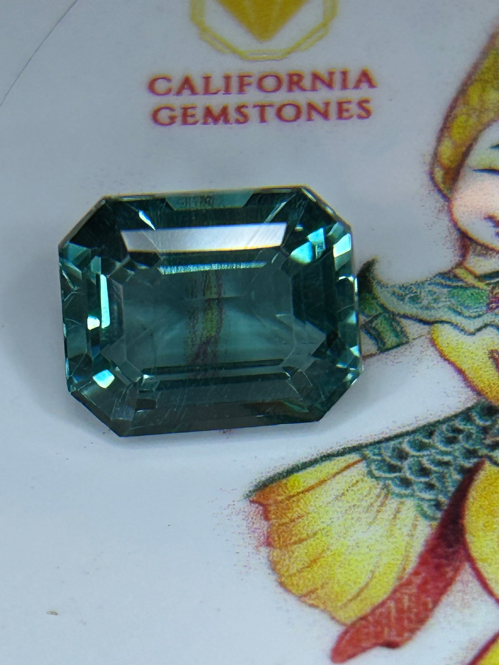 8.00 Carat ---- Natural Green Tourmaline--- Emerald Cut---EGL Certified: Offering exceptional brilliance and depth. The emerald cut—a rectangular step-cut with truncated corners—enhances the stone's transparency and showcases its rich color, making it an excellent cent