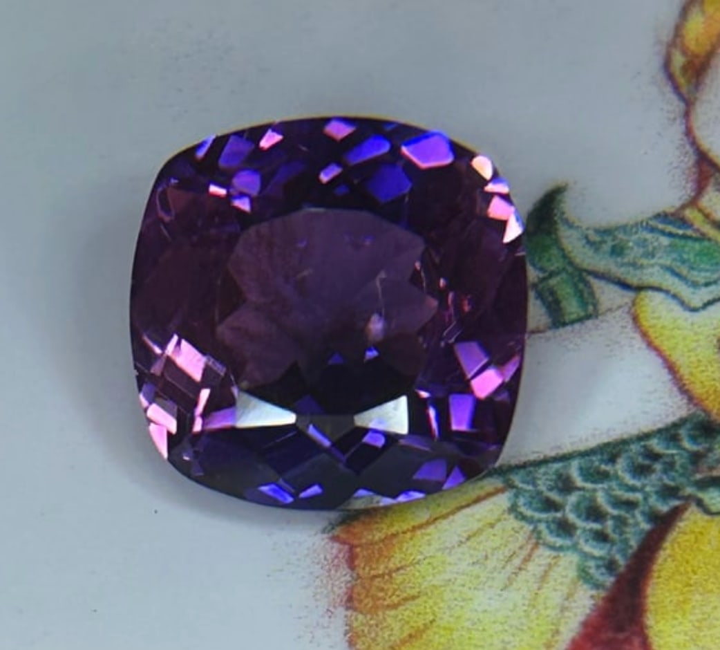 10.00 Carat ---- Natural Ceylon Purple Sapphire ----Cushion Cut: Sourced directly from the legendary mines of Ceylon (Sri Lanka). Known globally for producing gemstones with superior clarity and vibrant saturation, this collector-quality sapphire boasts a majestic 