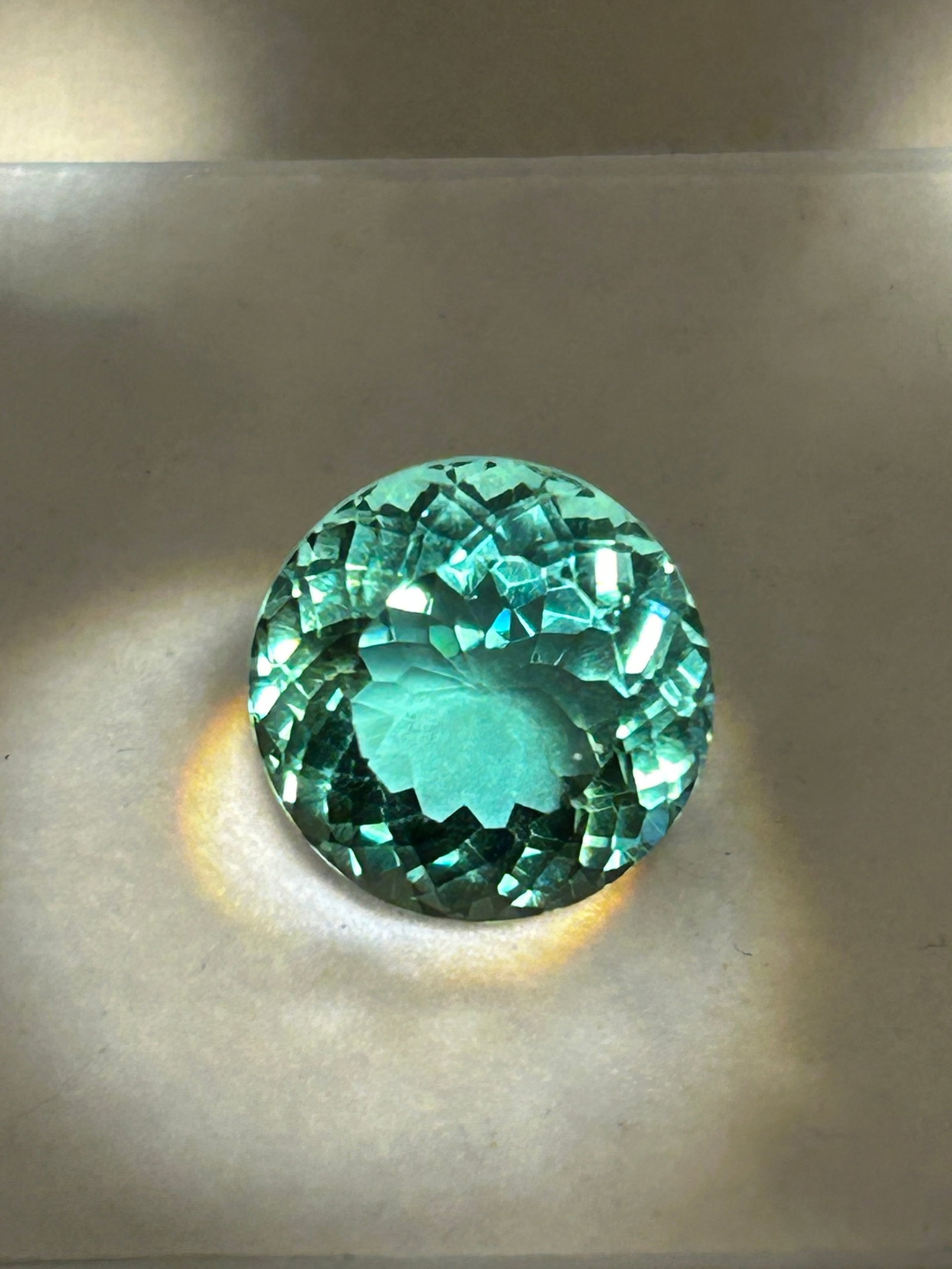 11 Carat -- Natural Green Sapphire-- Brilliant Round Cut --- EGL Certified: a rare and valuable gemstone featuring a blended red-and-blue hue. At this large size, a cushion cut maximizes internal light reflection while accentuating a rich, velvety violet-purple color profile.