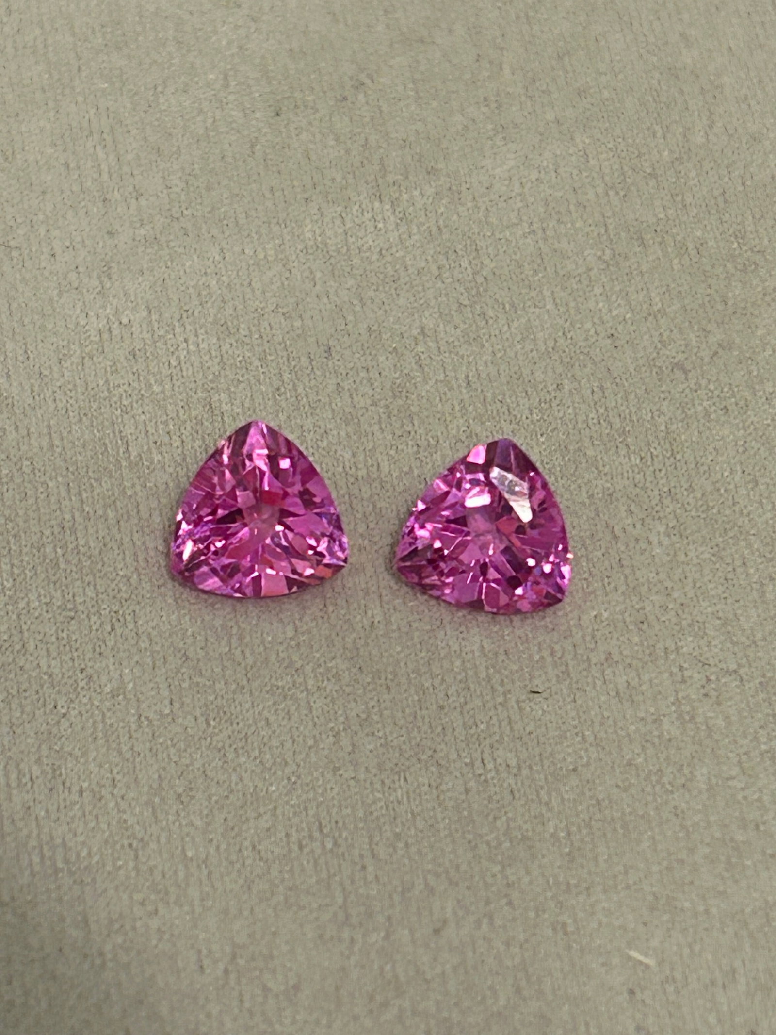3.15 Carat ---- Natural Mogok Ruby PAIR --- Trillion Cut: A Pink Ruby pair featuring a trillion cut is a highly coveted and rare find. Mined in Myanmar, these gemstones are celebrated globally for their intense "pigeon blood" red hue, exceptional