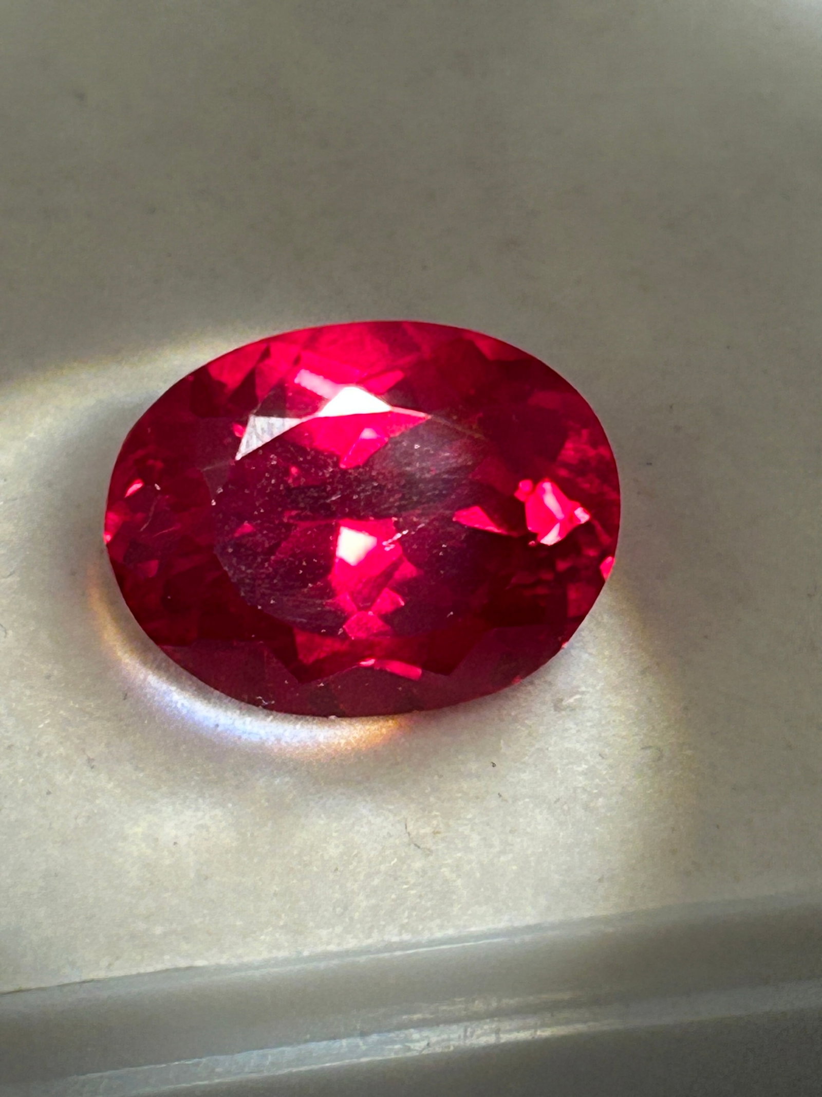 9.60 Carat ---- Natural Burmese Pigeon Blood Ruby ---- Oval Cut: Featuring a deep, vivid red color. The oval cut maximizes its carat weight and brilliance, featuring a mixed cut to enhance color. Originating from Burma, it displays high fluorescence. The coveted "P