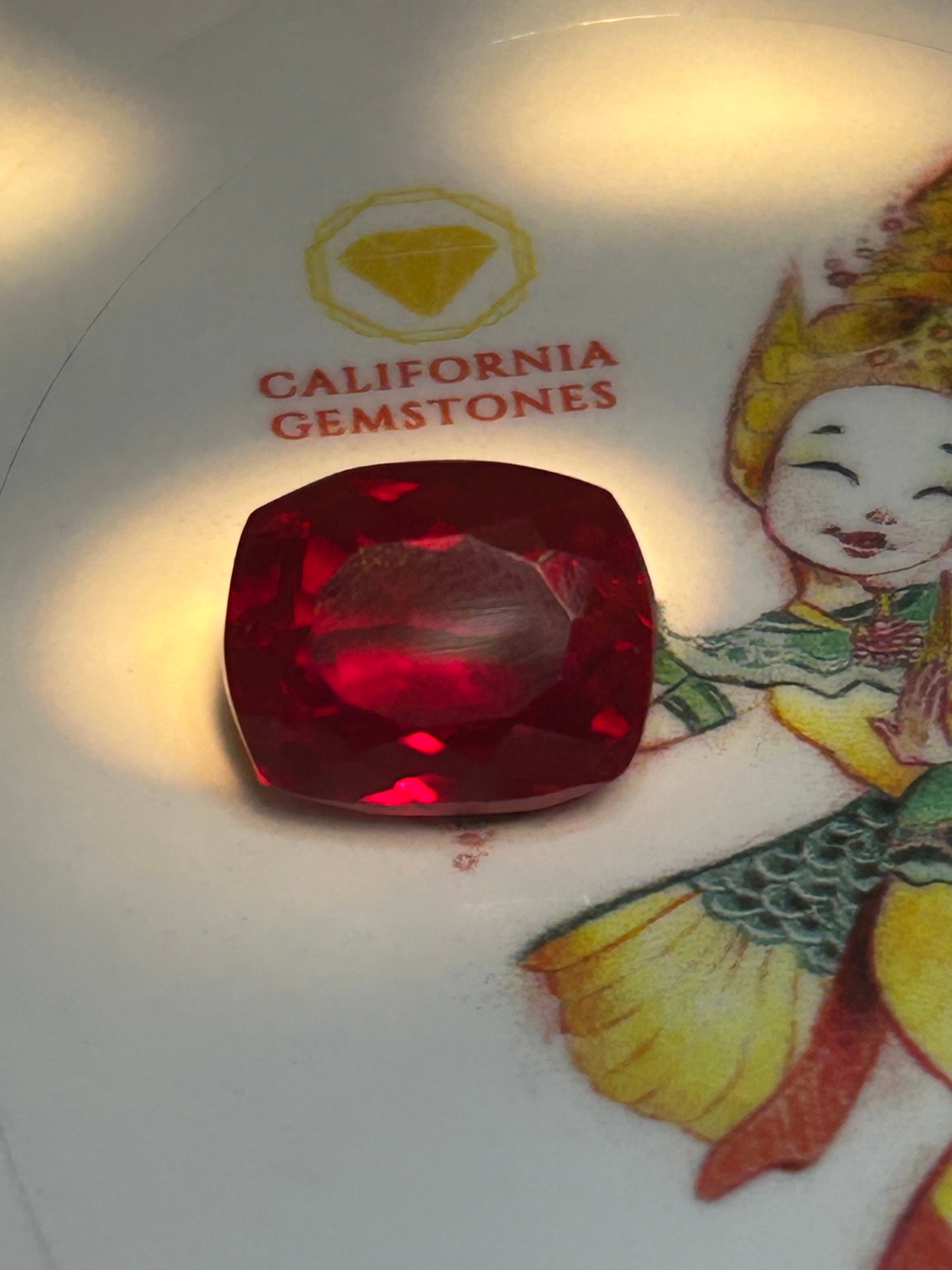 7.5 Carat ---- Blood Red Ruby --- Cushion Cut: A museum-quality, extraordinarily rare gemstone. It combines the most coveted color standard in the world with a soft, brilliant cut that maximizes the stone's fiery, fluorescent red glow.