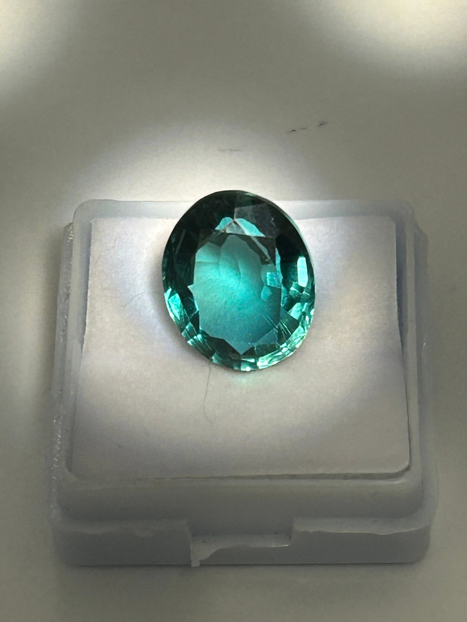 9.00 Carat --- Natural Brazilian Imperial Topaz--- Trillion Cut: With a brilliant oval cut is a high-clarity, and deeply colored gemstone. Zambian emeralds are known for having fewer inclusions and a cooler, more bluish-green tone compared to Colombian varieties, m