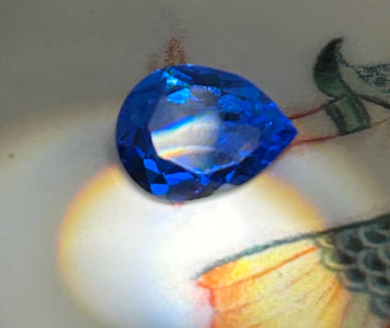 1.70 Carat ---- Natural Blue Sapphire ----Pear Cut: Elevate your jewelry collection with this mesmerizing 1.70-carat natural blue sapphire. Masterfully shaped into an elegant pear cut, this gemstone showcases a perfect balance of rich, velvety blue bod