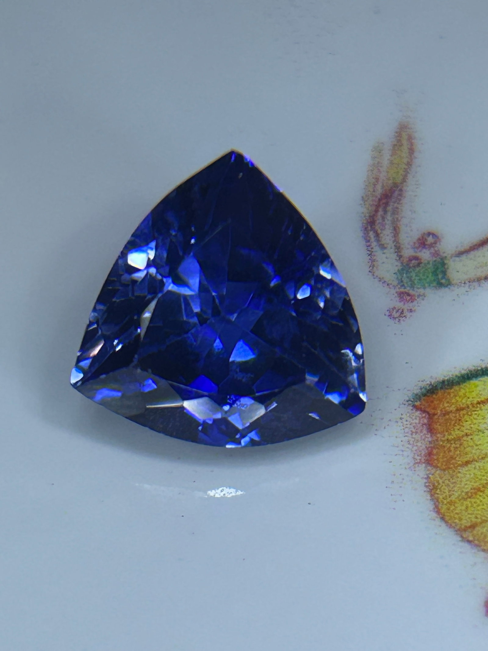6.00 Carat Blue Tanzanite Trillion Cut: an exceptionally rare, investment-grade gemstone sourced exclusively from the Merelani Hills of Tanzania. At 6.00 carats, this stone falls into an elite weight bracket, where Tanzanite naturally exhib