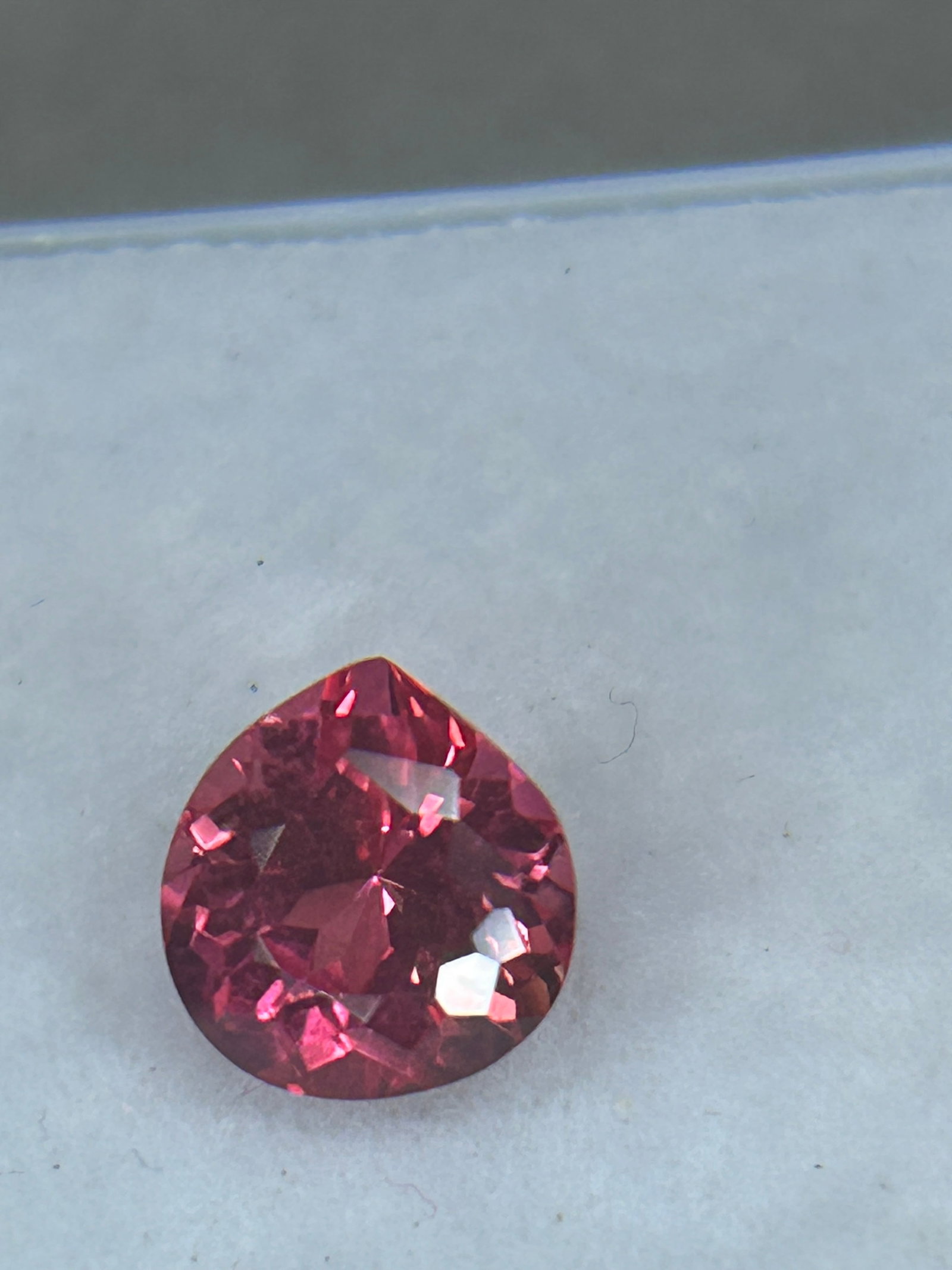 2.80 Carat Natural Rubellite Brilliant Pear Cut: A 2.80-carat natural rubellite with a brilliant pear cut features a rich magenta-red or vibrant red hue, excellent clarity, and balanced proportions ideal for a bold centerpiece.